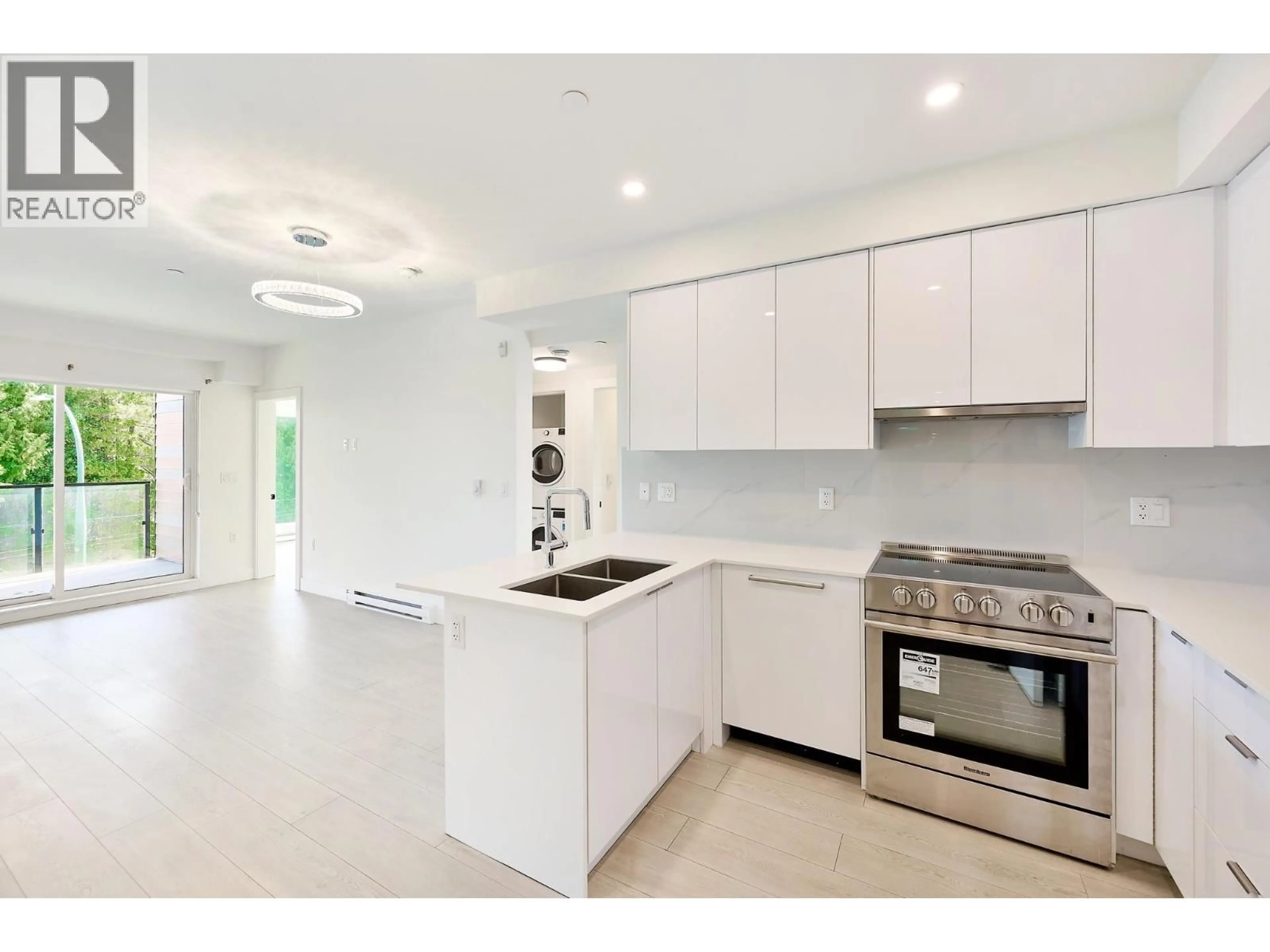 Open concept kitchen, ceramic/tile floor for 406 - 5399 JOYCE STREET, Vancouver British Columbia V5R4H3