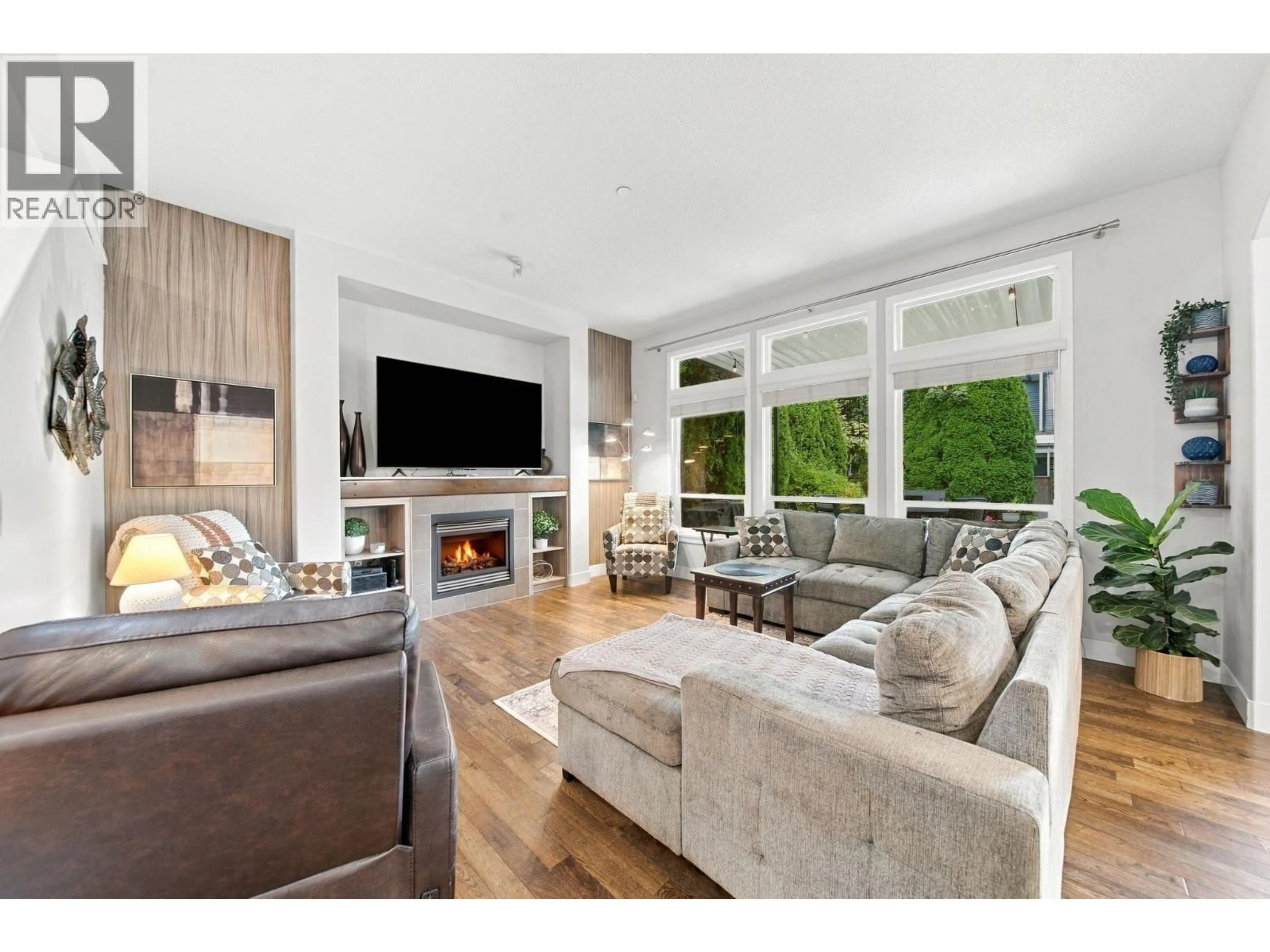 Living room with furniture, wood/laminate floor for 19556 THORBURN WAY, Pitt Meadows British Columbia V3Y0B3