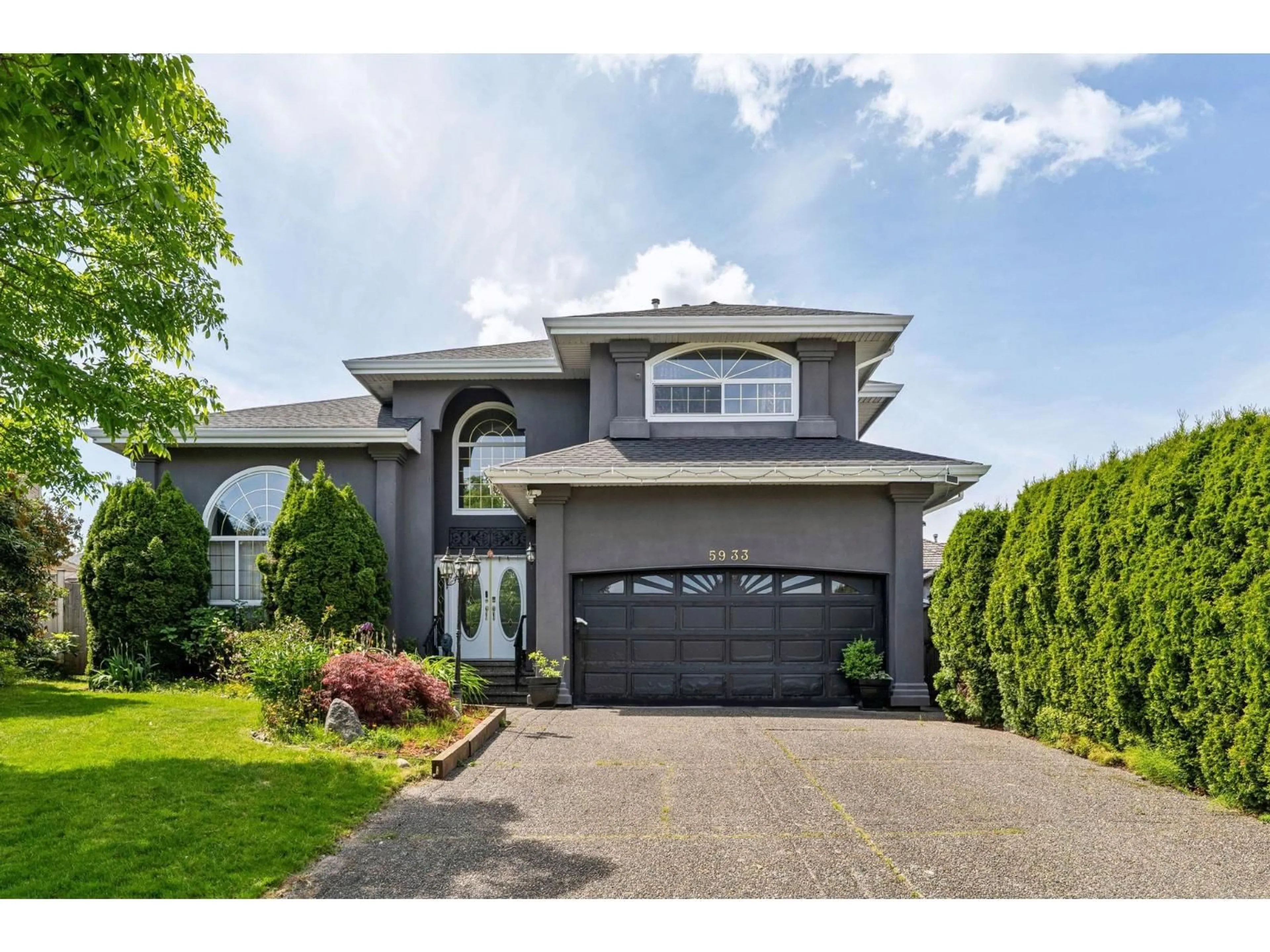 Home with vinyl exterior material, street for 5933 137A STREET, Surrey British Columbia V3X3K9