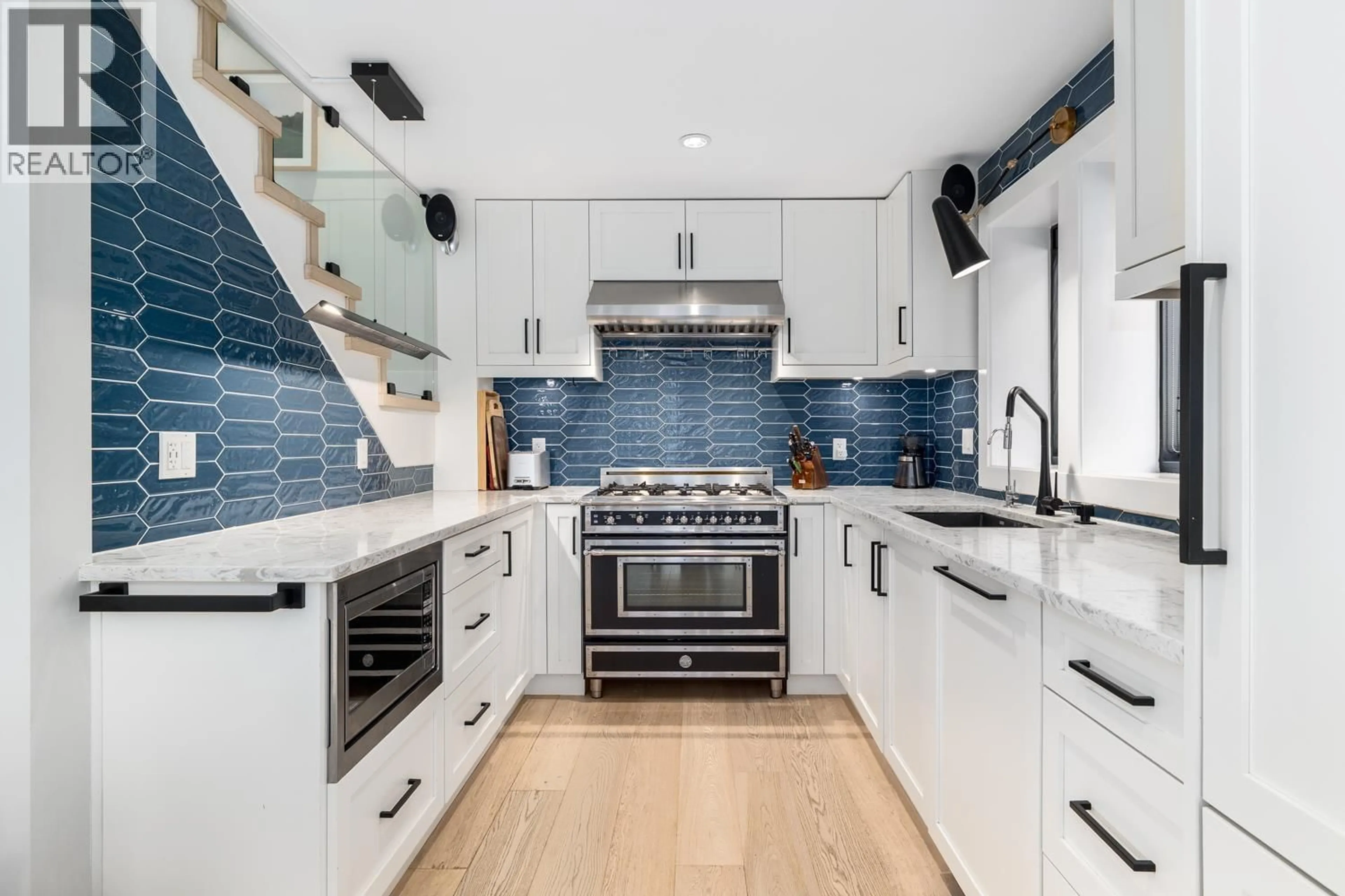 Contemporary kitchen, ceramic/tile floor for 3918 CAROLINA STREET, Vancouver British Columbia V5V1X8