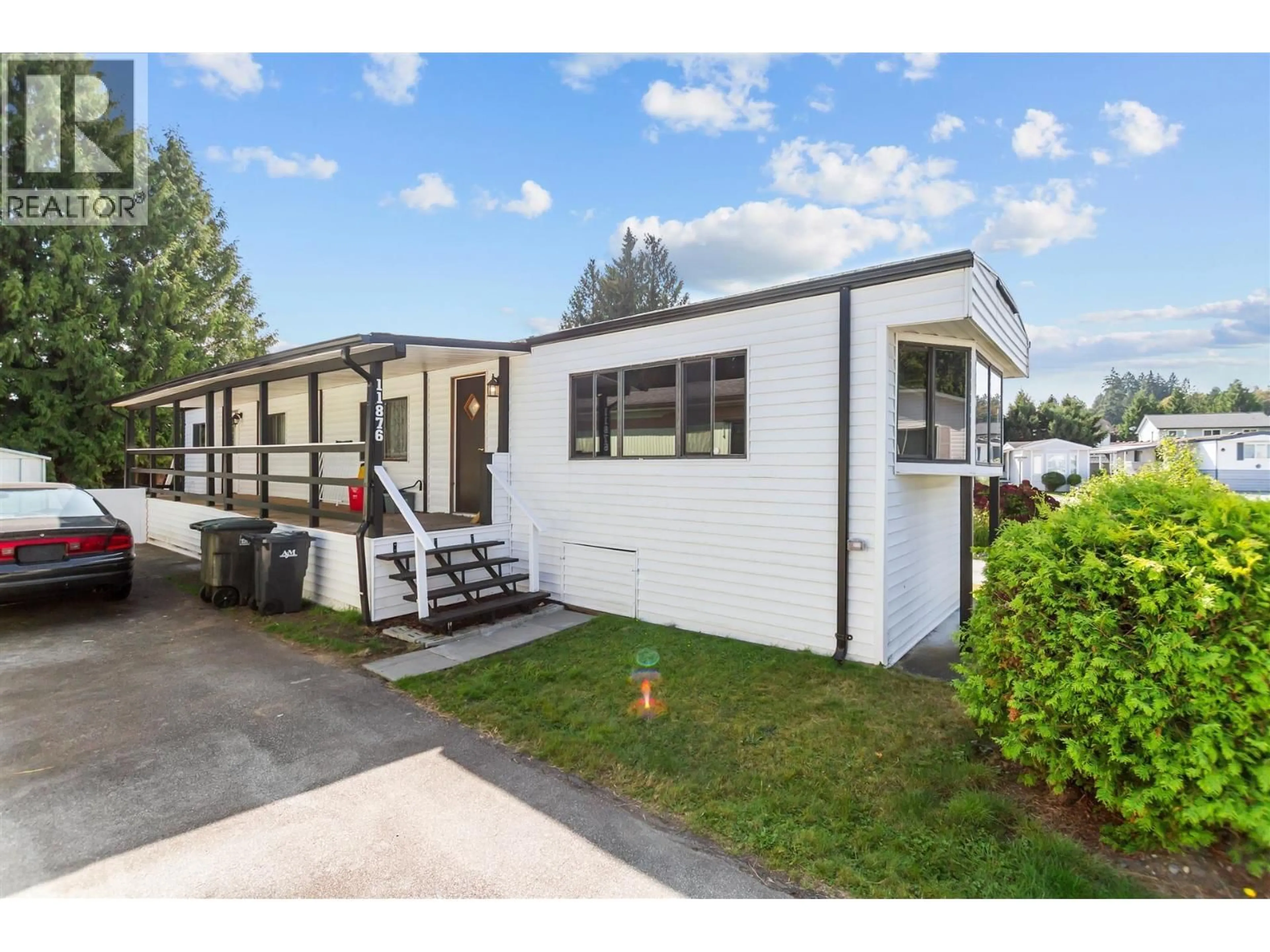Home with vinyl exterior material, street for 18 - 11876 POPLAR DRIVE, Pitt Meadows British Columbia V3Y1Z3