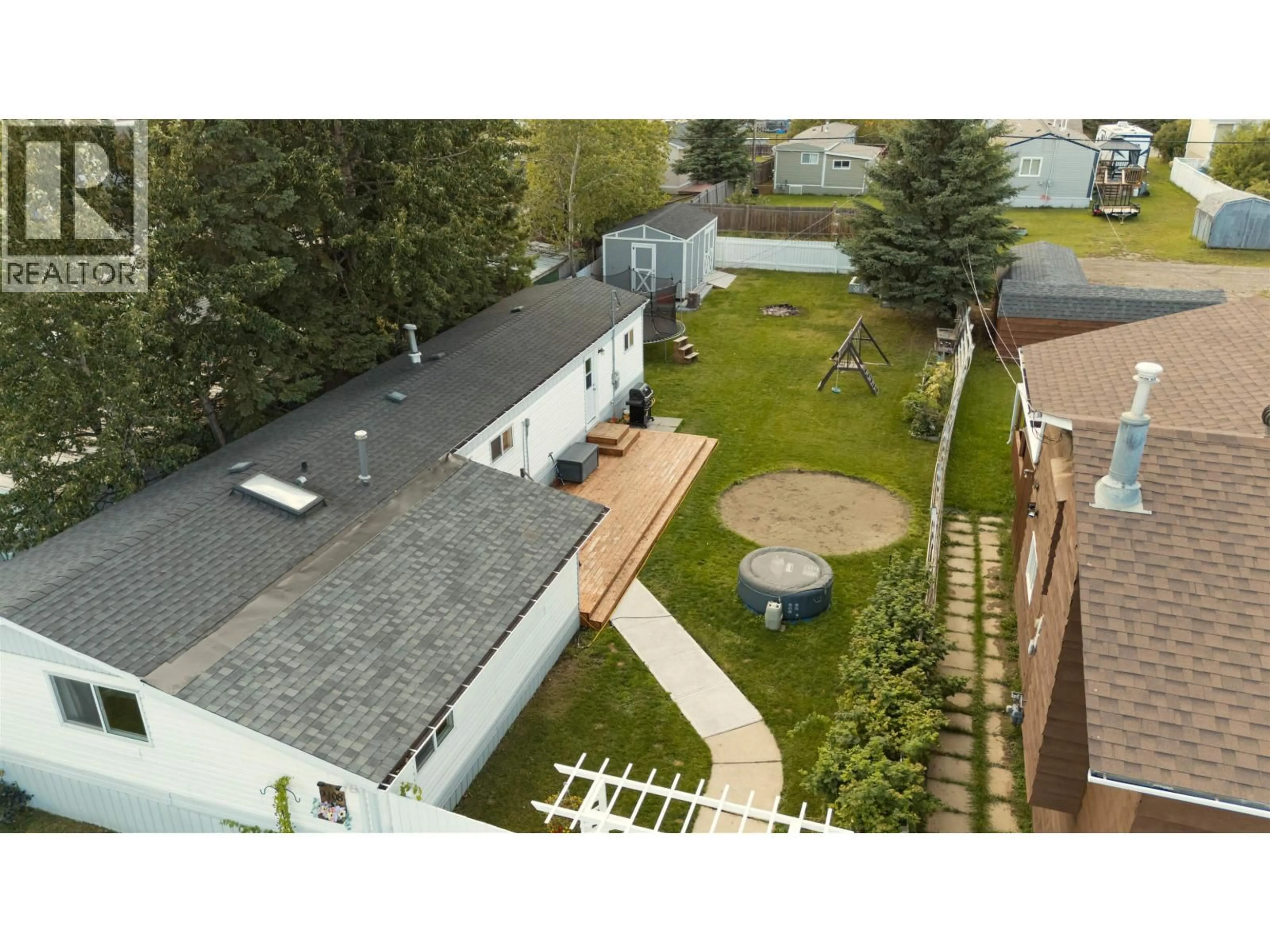 A pic from outside/outdoor area/front of a property/back of a property/a pic from drone, unknown for 9108 76 STREET, Fort St. John British Columbia V1J4N1