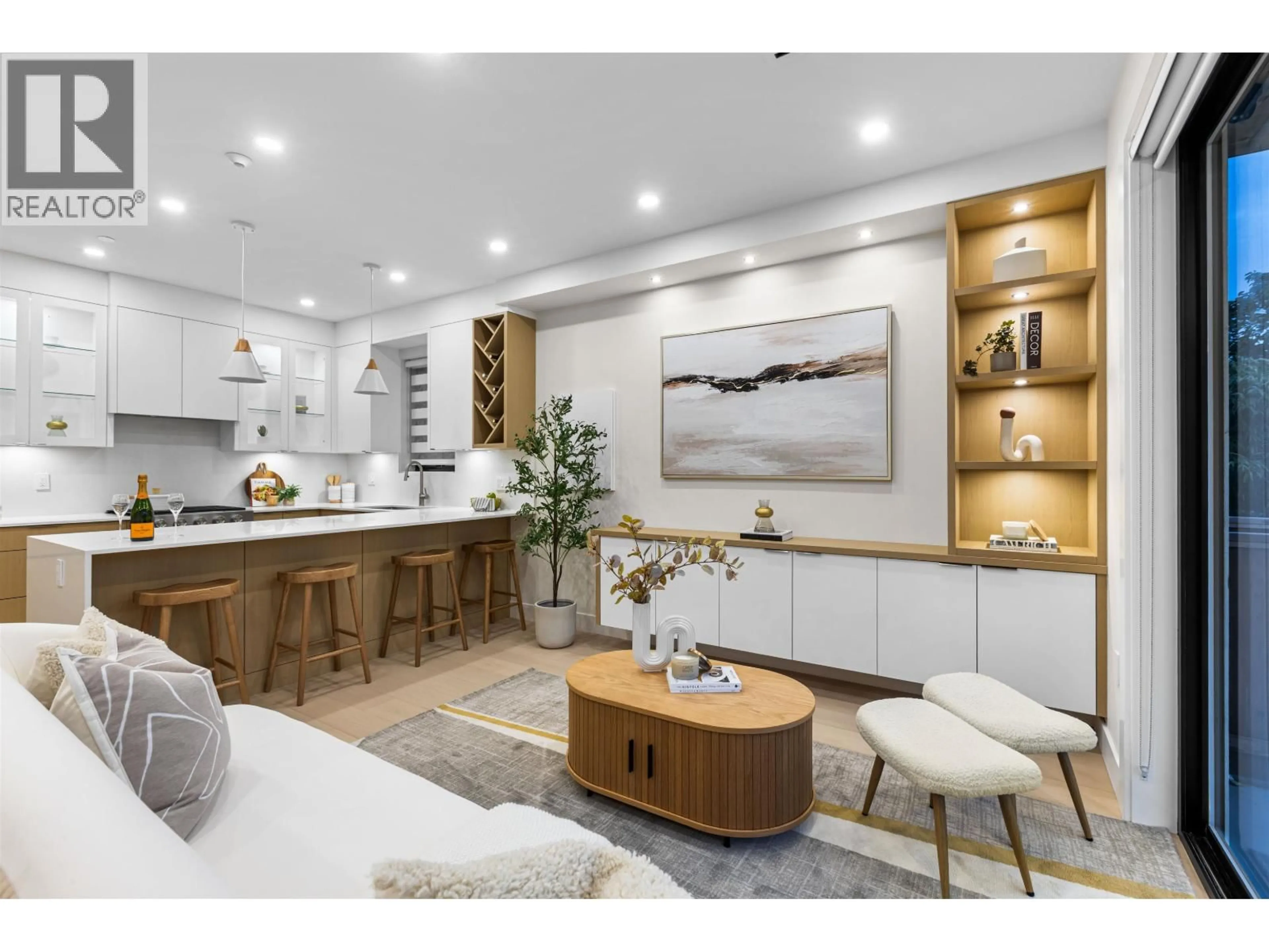 Open concept kitchen, wood/laminate floor for 1 - 2211 MANNERING AVENUE, Vancouver British Columbia V5N3C5