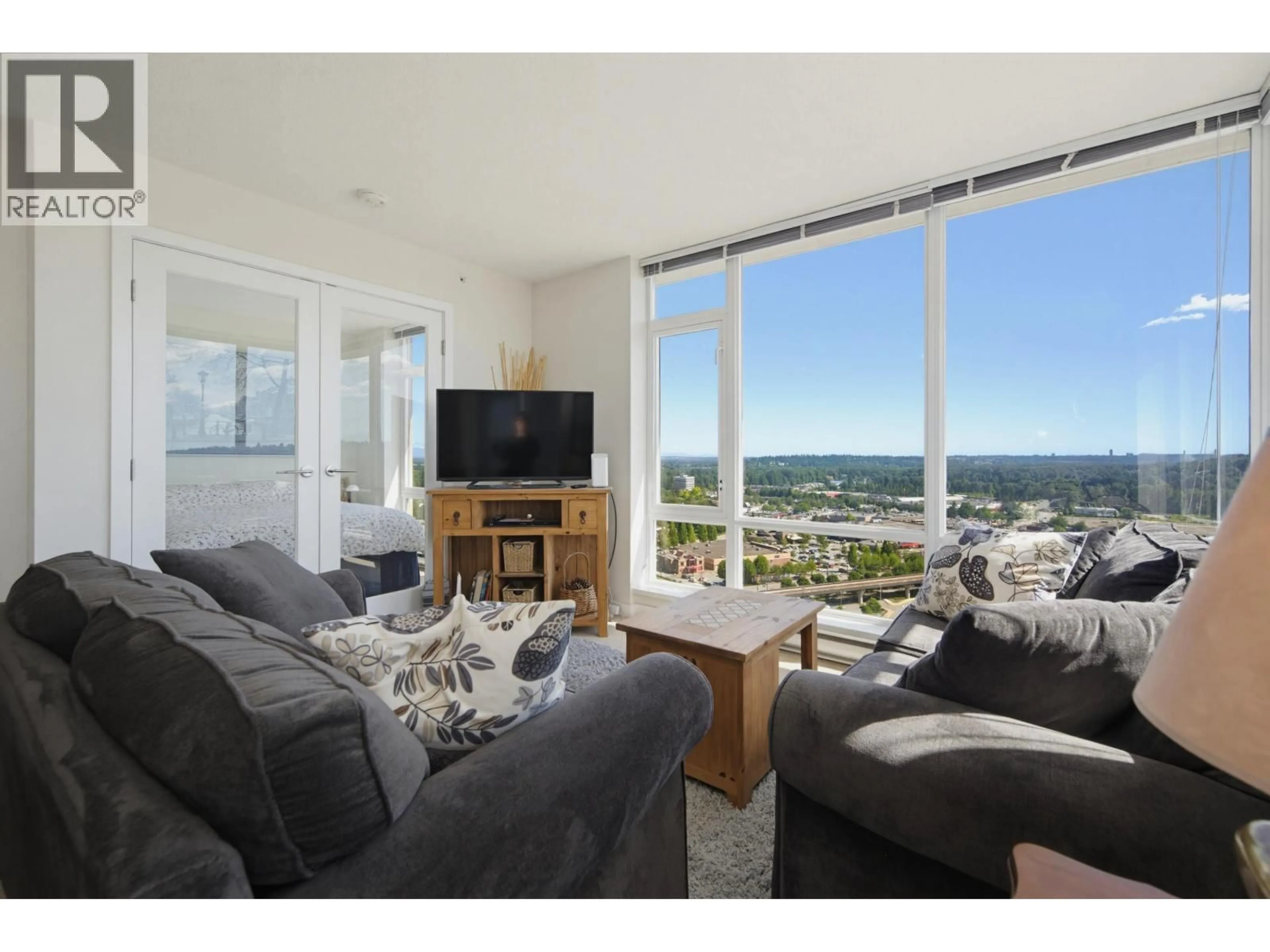 Living room with furniture, unknown for 2307 - 2980 ATLANTIC AVENUE, Coquitlam British Columbia V3B0G2