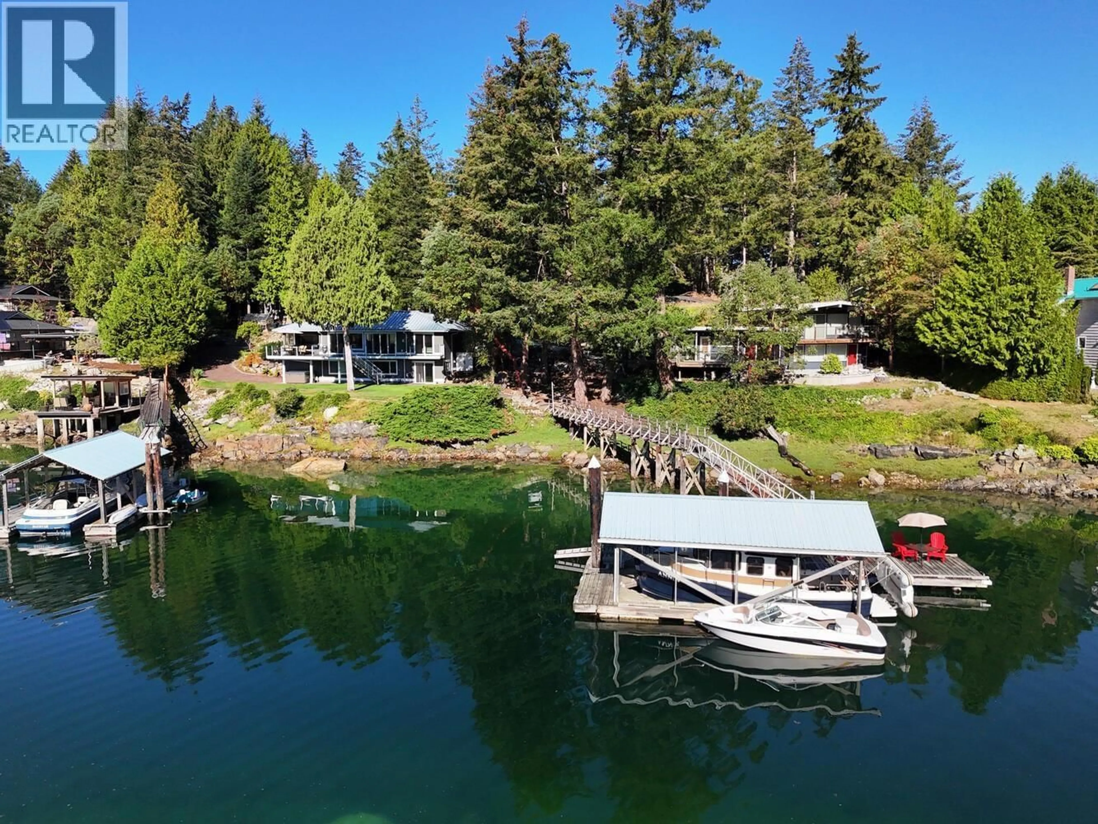 A pic from outside/outdoor area/front of a property/back of a property/a pic from drone, water/lake/river/ocean view for 12828 GILDEN ROAD, Madeira Park British Columbia V0N2H1