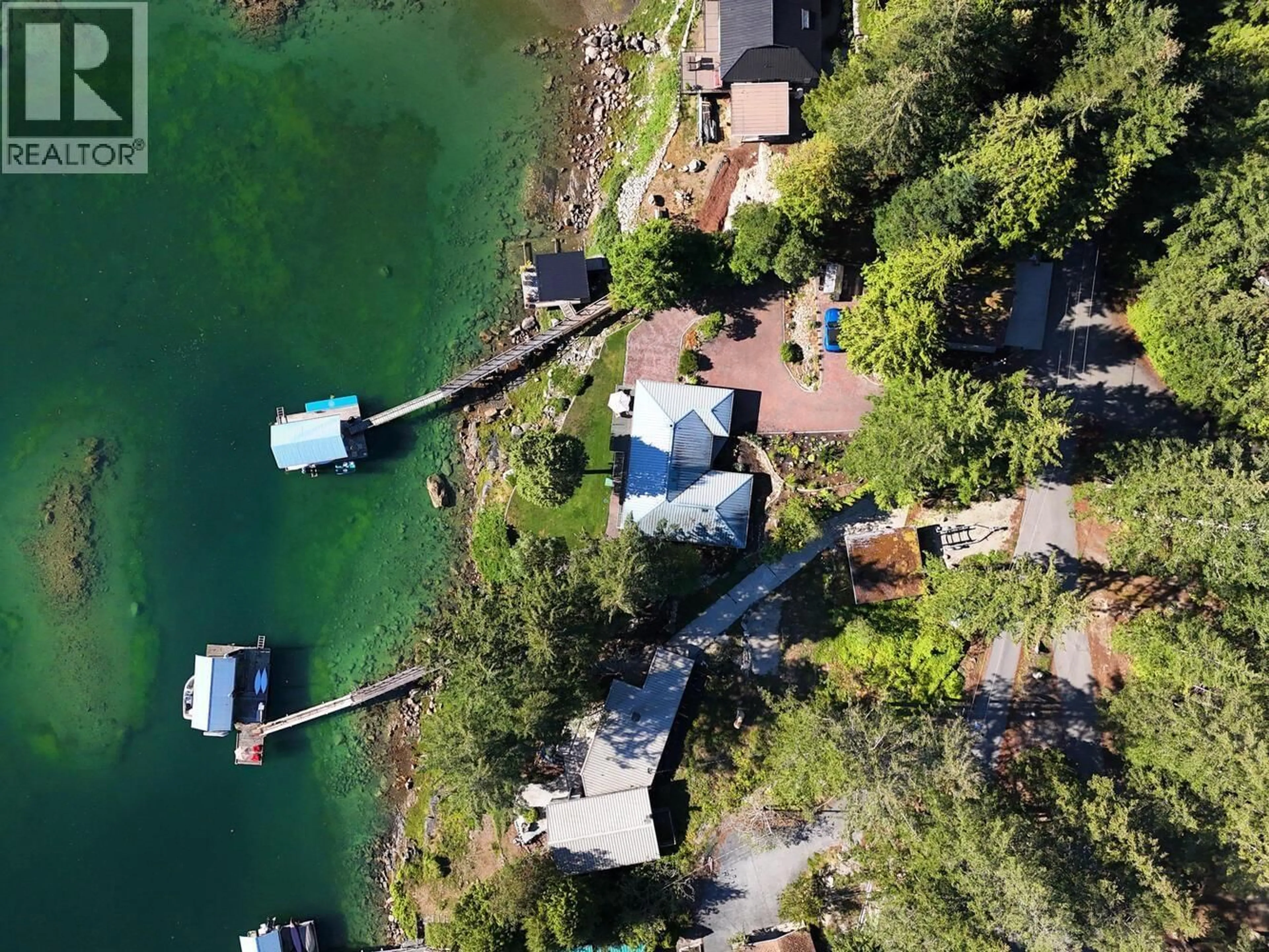 A pic from outside/outdoor area/front of a property/back of a property/a pic from drone, water/lake/river/ocean view for 12828 GILDEN ROAD, Madeira Park British Columbia V0N2H1