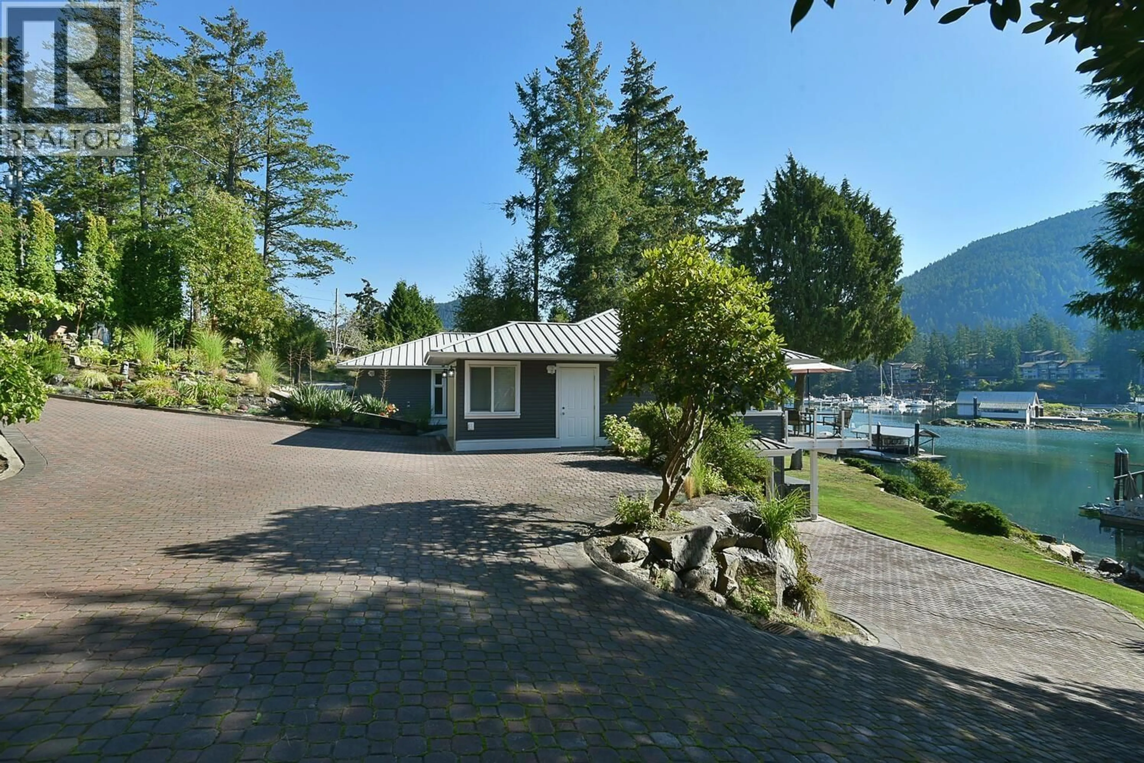 A pic from outside/outdoor area/front of a property/back of a property/a pic from drone, water/lake/river/ocean view for 12828 GILDEN ROAD, Madeira Park British Columbia V0N2H1