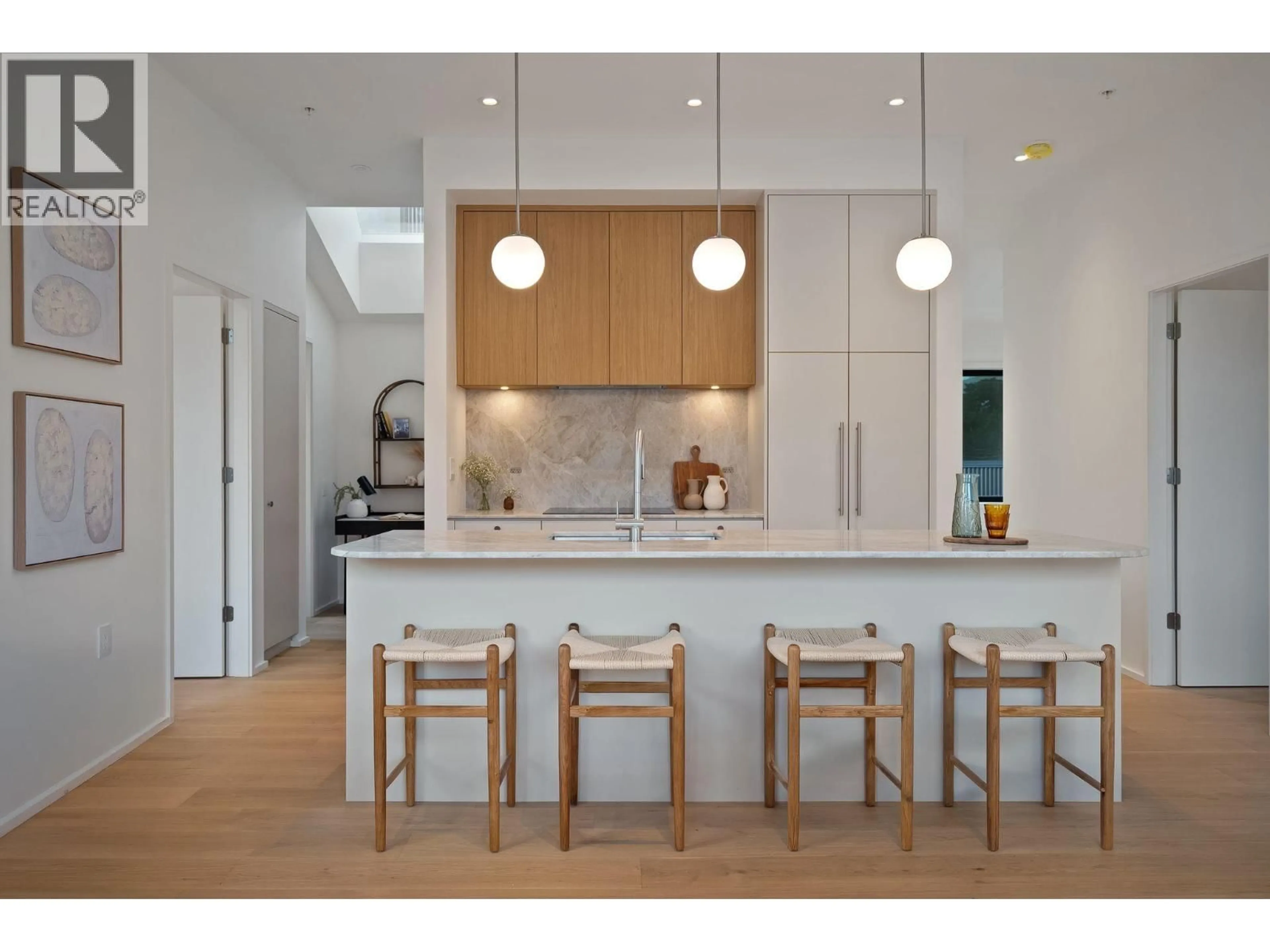 Contemporary kitchen, wood/laminate floor for 166 38TH AVENUE, Vancouver British Columbia V5W1H1