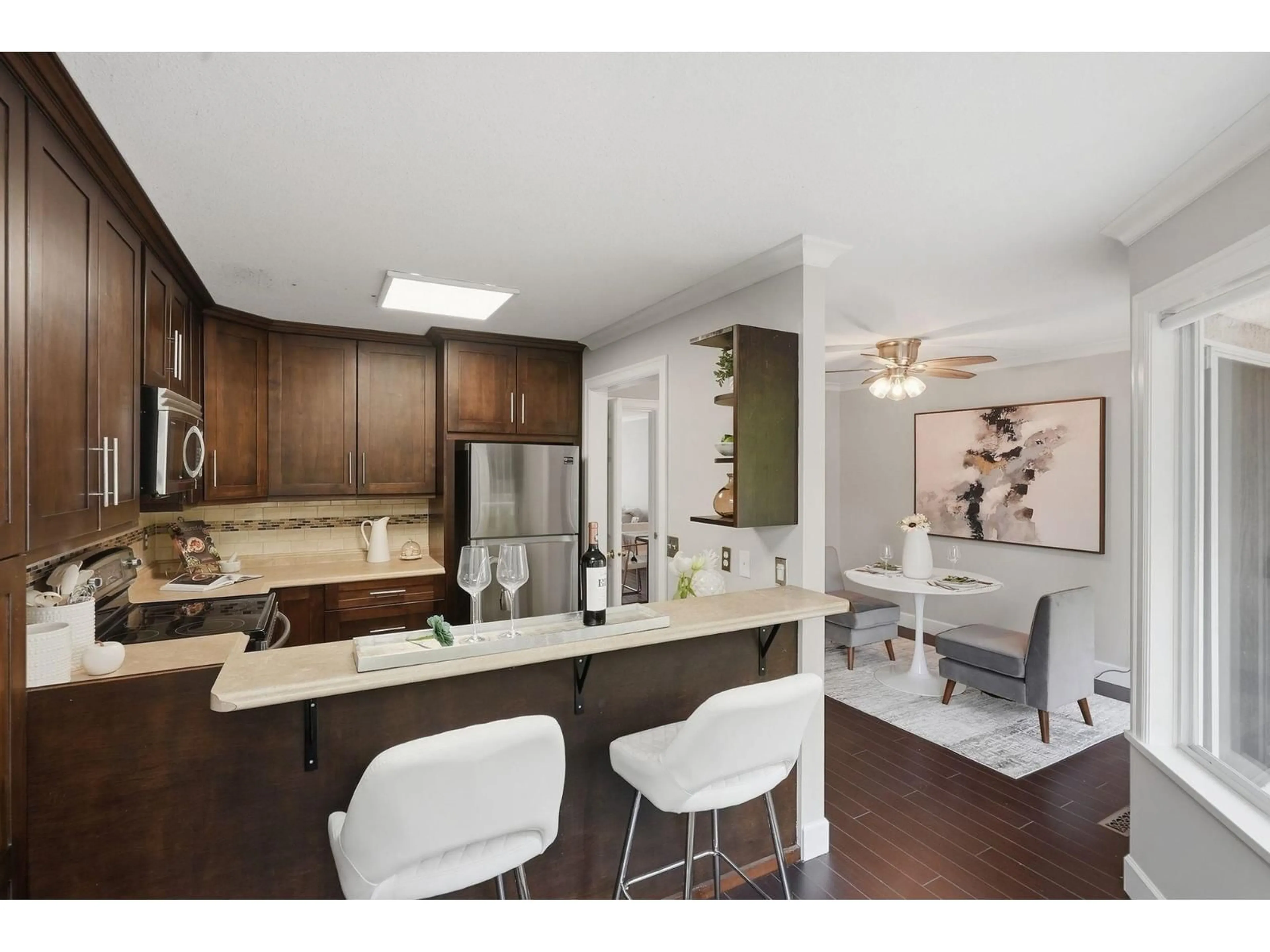 Open concept kitchen, wood/laminate floor for 2 - 11952 64 AVENUE, Delta British Columbia V4E1C8