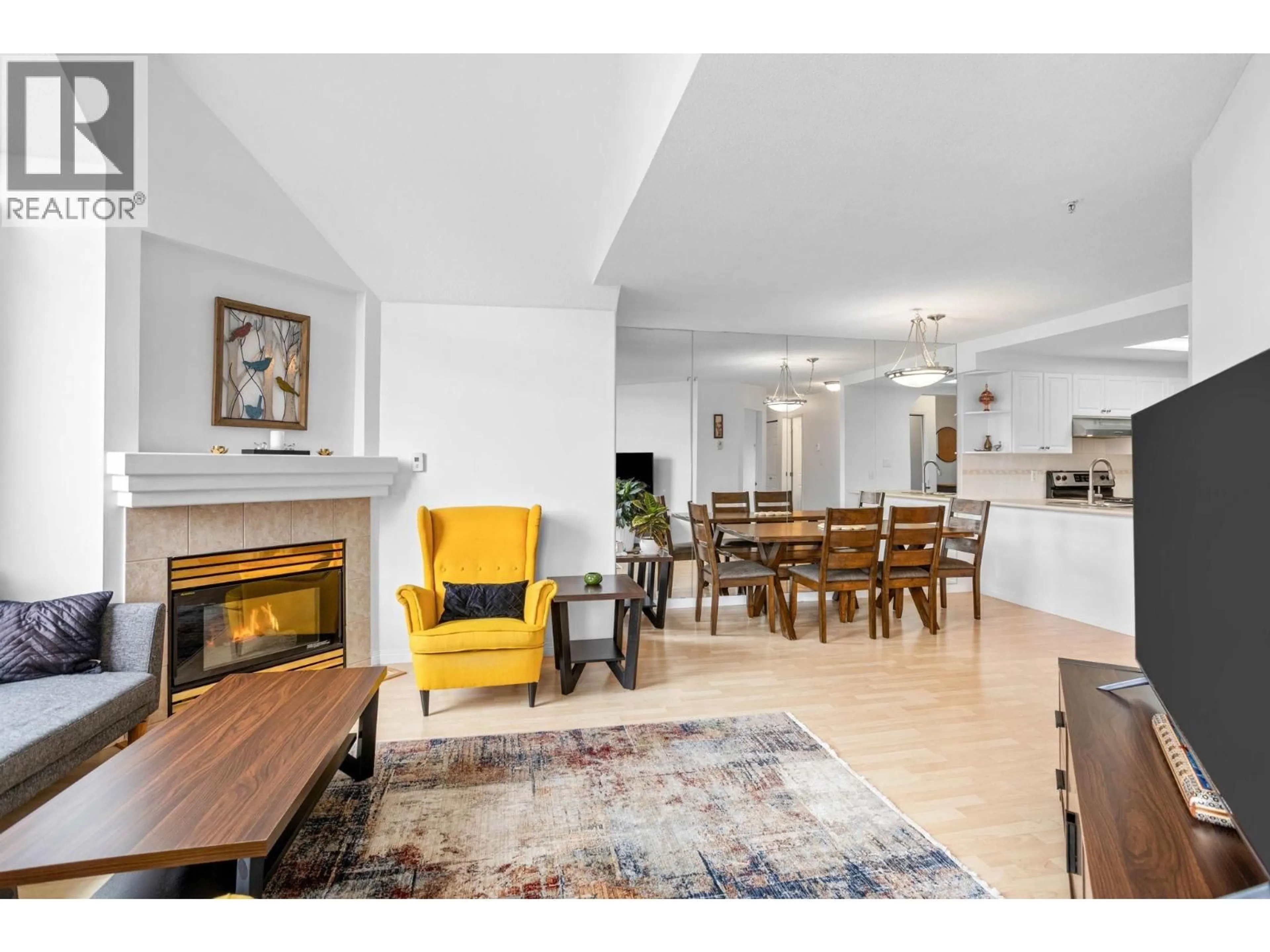 Living room with furniture, wood/laminate floor for 304 - 1650 GRANT AVENUE, Port Coquitlam British Columbia V3B7V2
