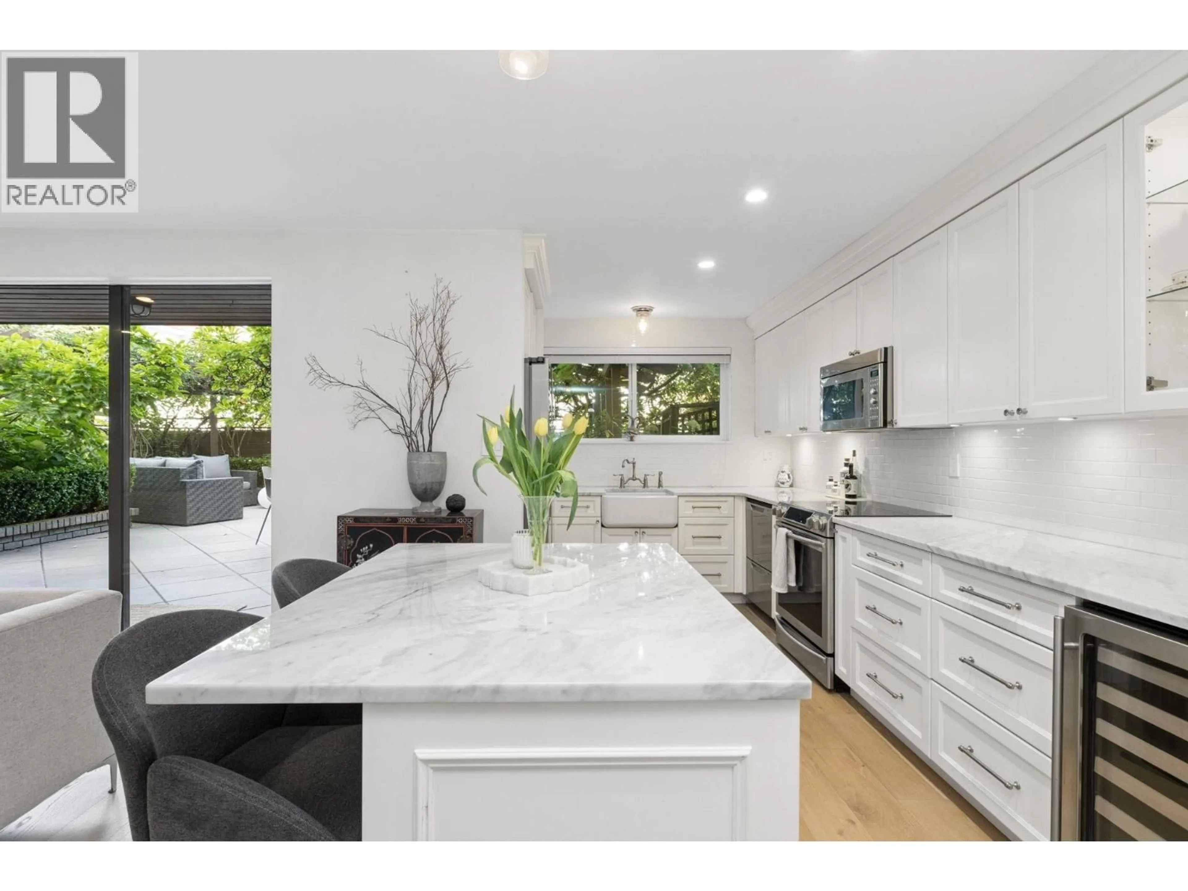Contemporary kitchen, ceramic/tile floor for 104 - 2211 WEST 2ND AVE, Vancouver British Columbia V6K1H8