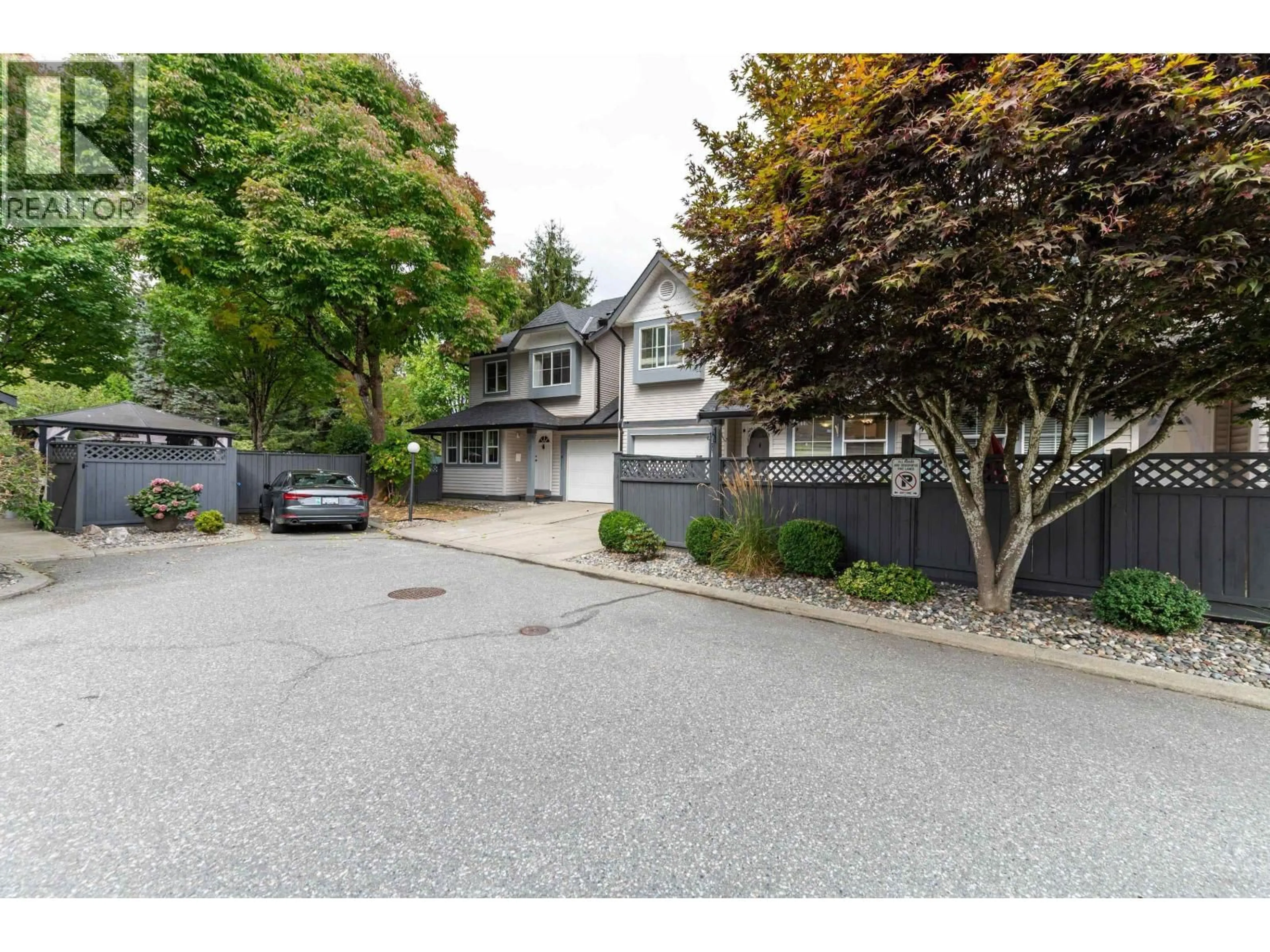 A pic from outside/outdoor area/front of a property/back of a property/a pic from drone, street for 8 - 21015 118 AVENUE, Maple Ridge British Columbia V2X8B7