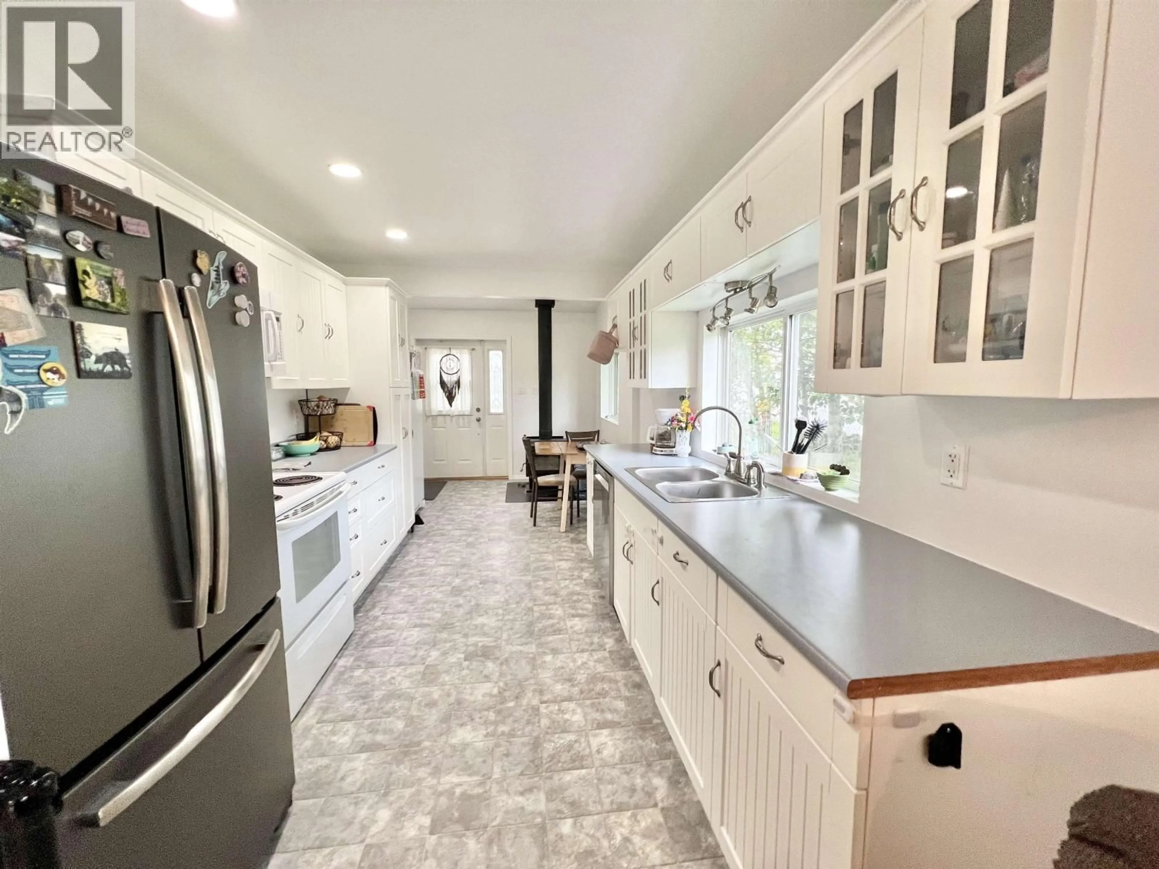 Open concept kitchen, ceramic/tile floor for 202 9TH AVENUE, Prince Rupert British Columbia V8J2S7