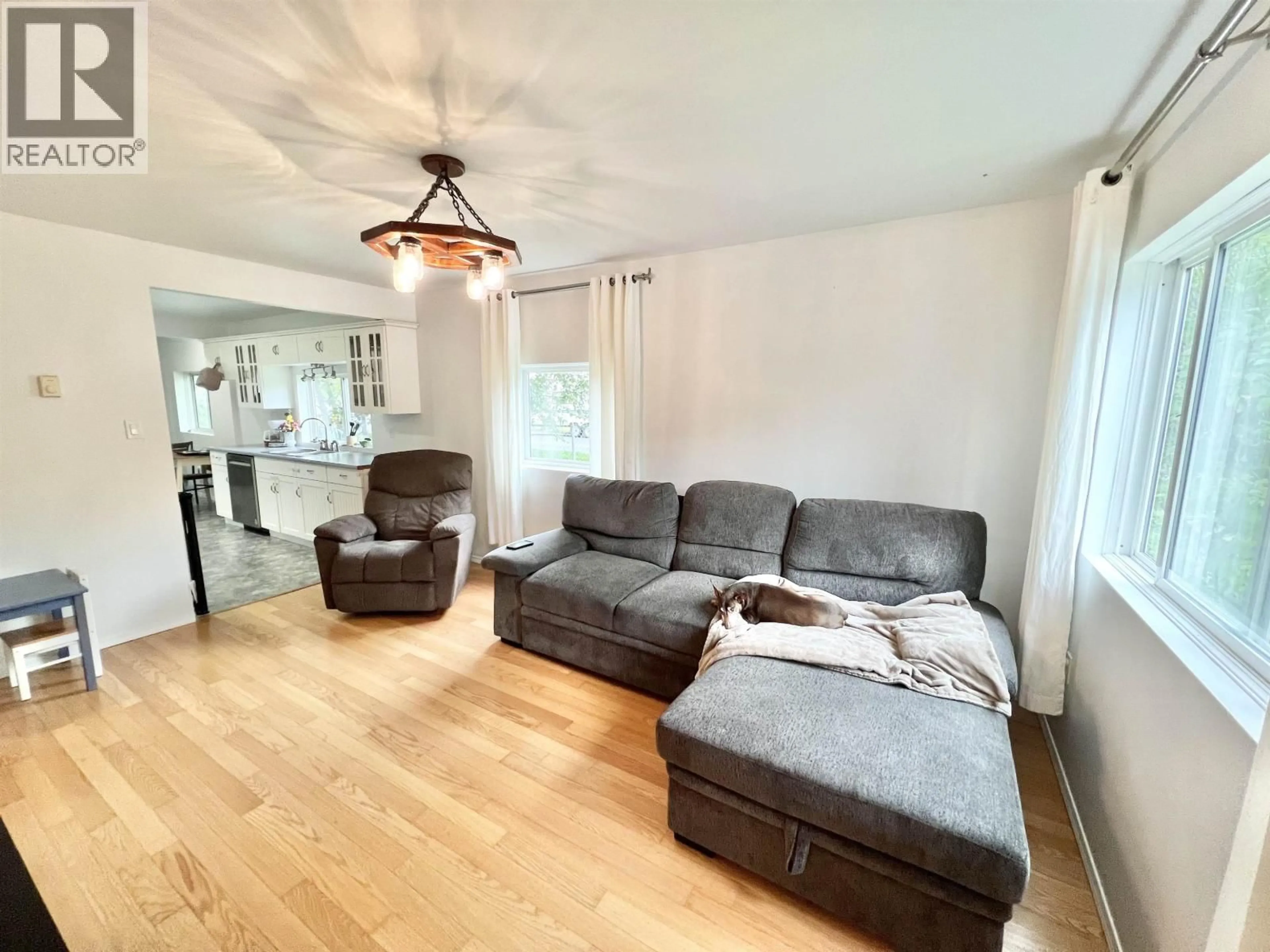 Living room with furniture, wood/laminate floor for 202 9TH AVENUE, Prince Rupert British Columbia V8J2S7