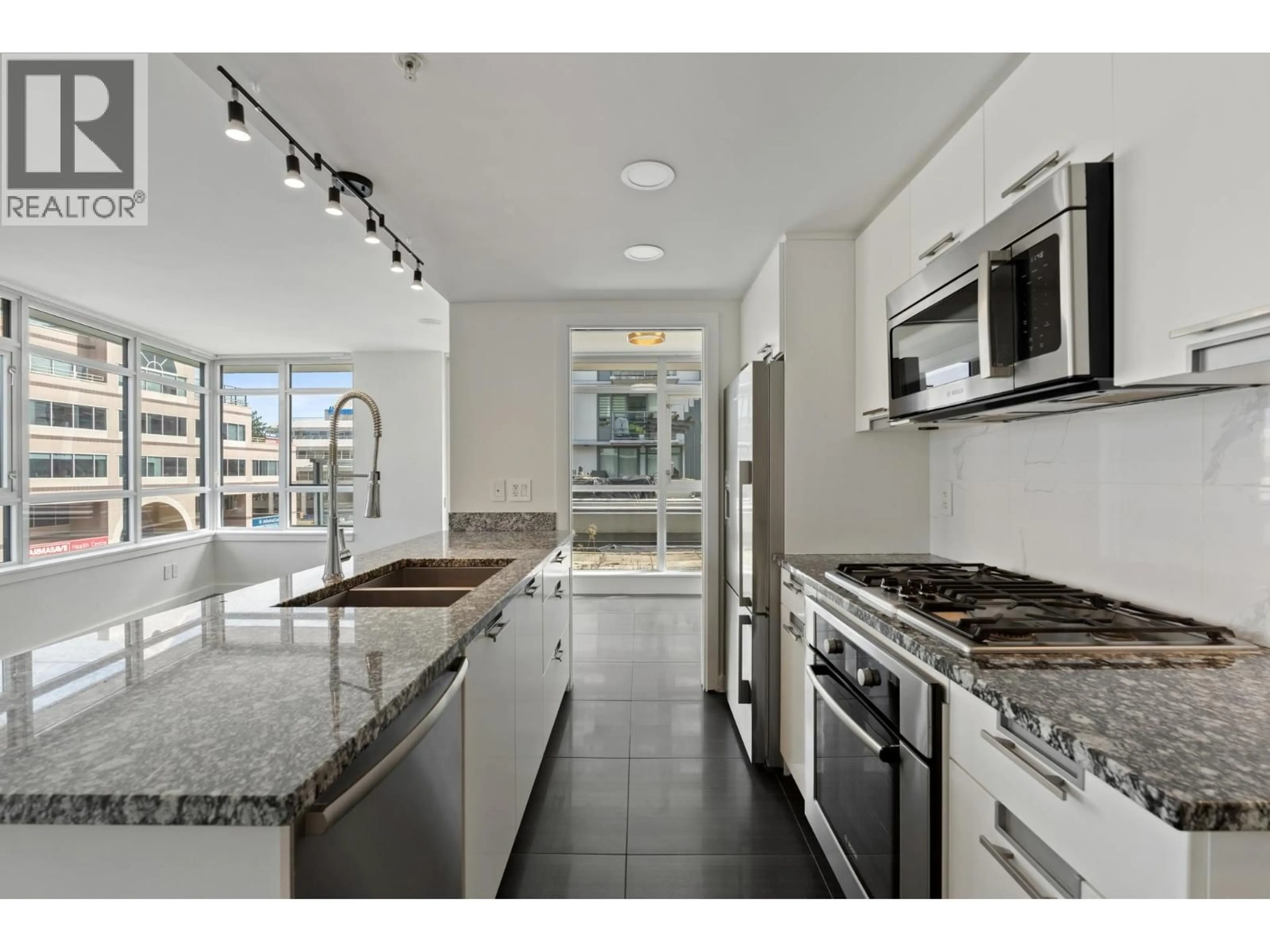 Standard kitchen, ceramic/tile floor for 569 - 2080 WEST BROADWAY STREET, Vancouver British Columbia V6J0C7