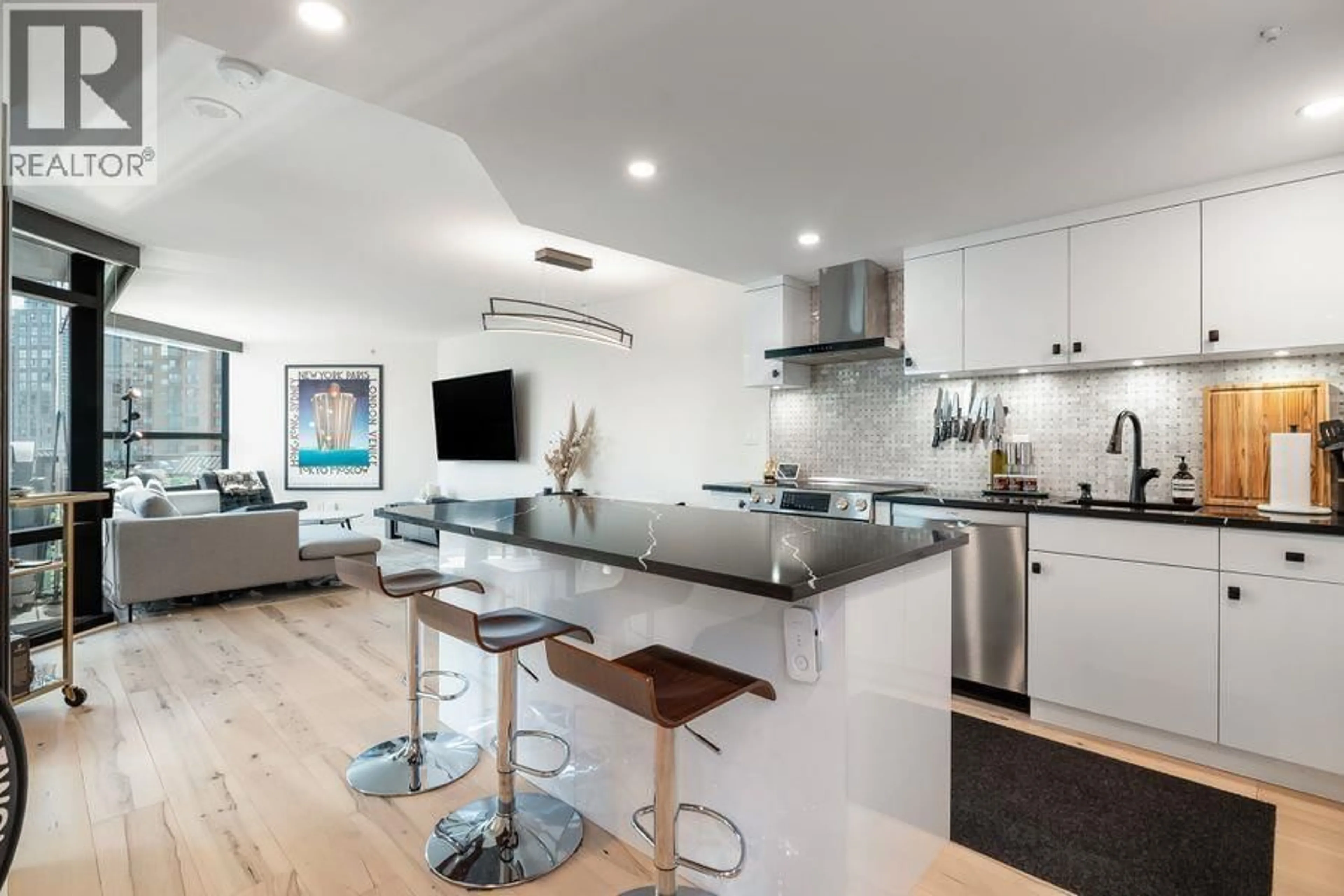 Open concept kitchen, wood/laminate floor for 710 - 1050 BURRARD STREET, Vancouver British Columbia V6Z2S3