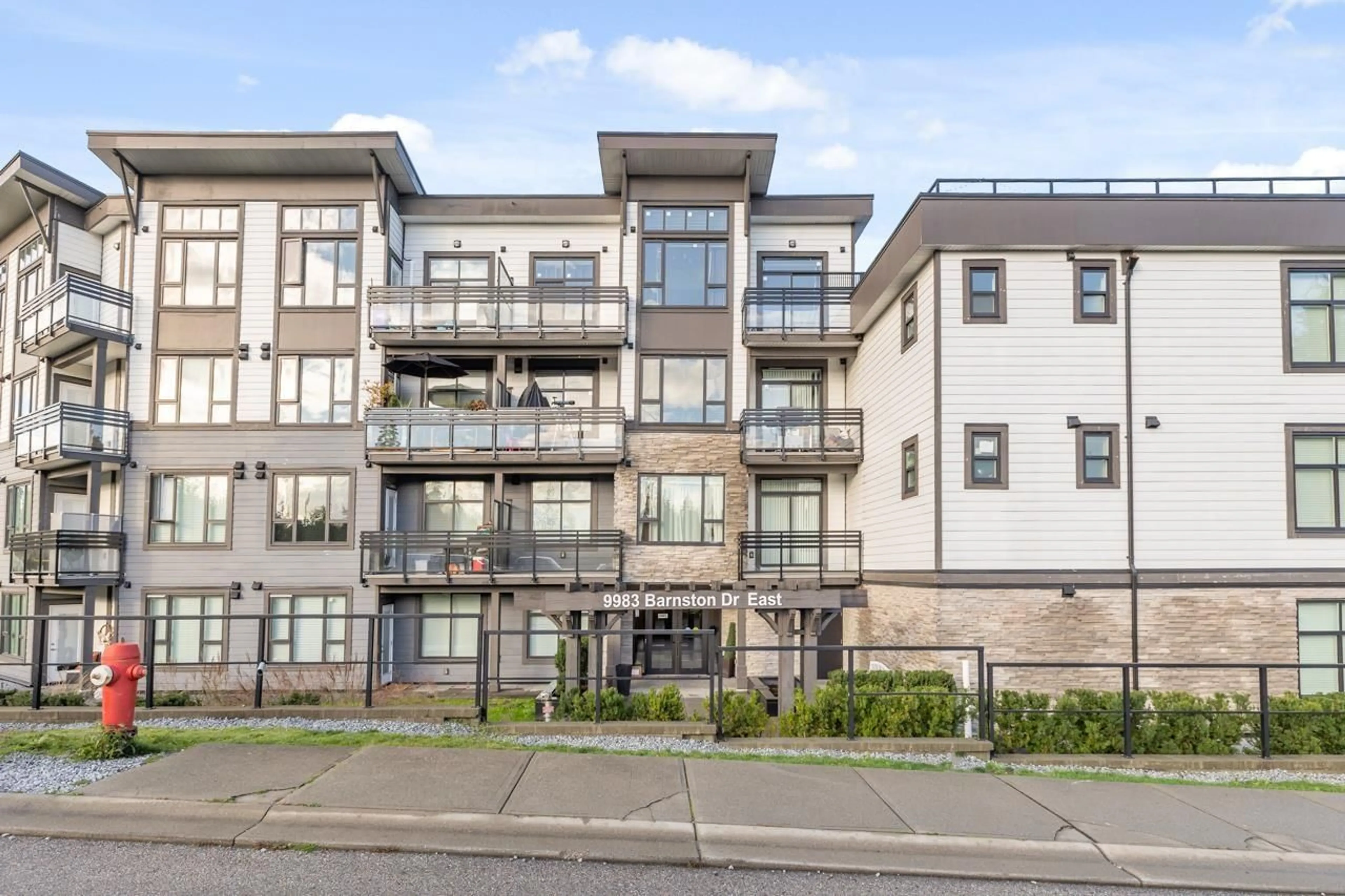 A pic from outside/outdoor area/front of a property/back of a property/a pic from drone, building for 309 - 9983 BARNSTON DRIVE EAST, Surrey British Columbia V4N6T3