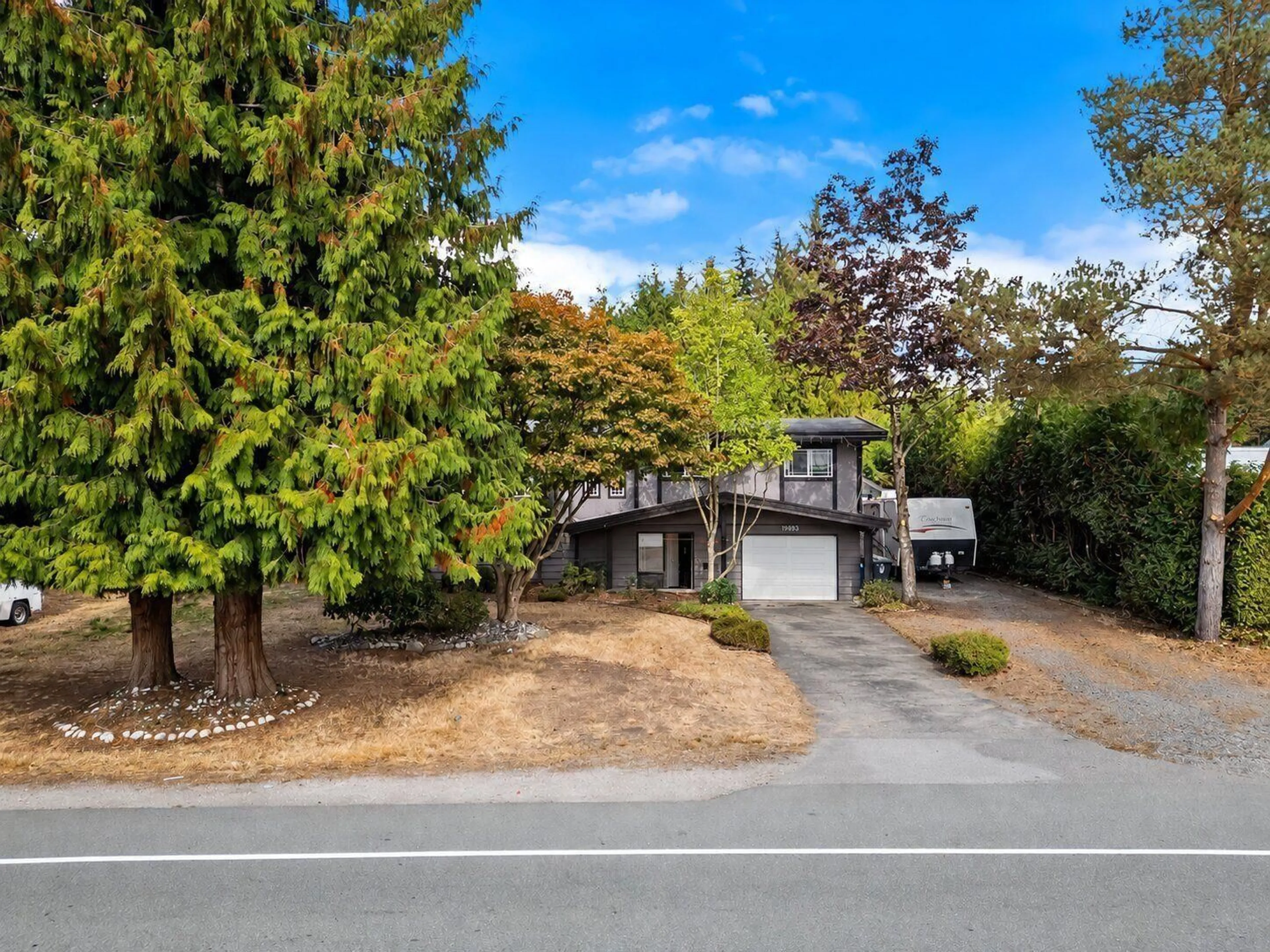 A pic from outside/outdoor area/front of a property/back of a property/a pic from drone, street for 19893 38A AVENUE, Langley British Columbia V3A2V1