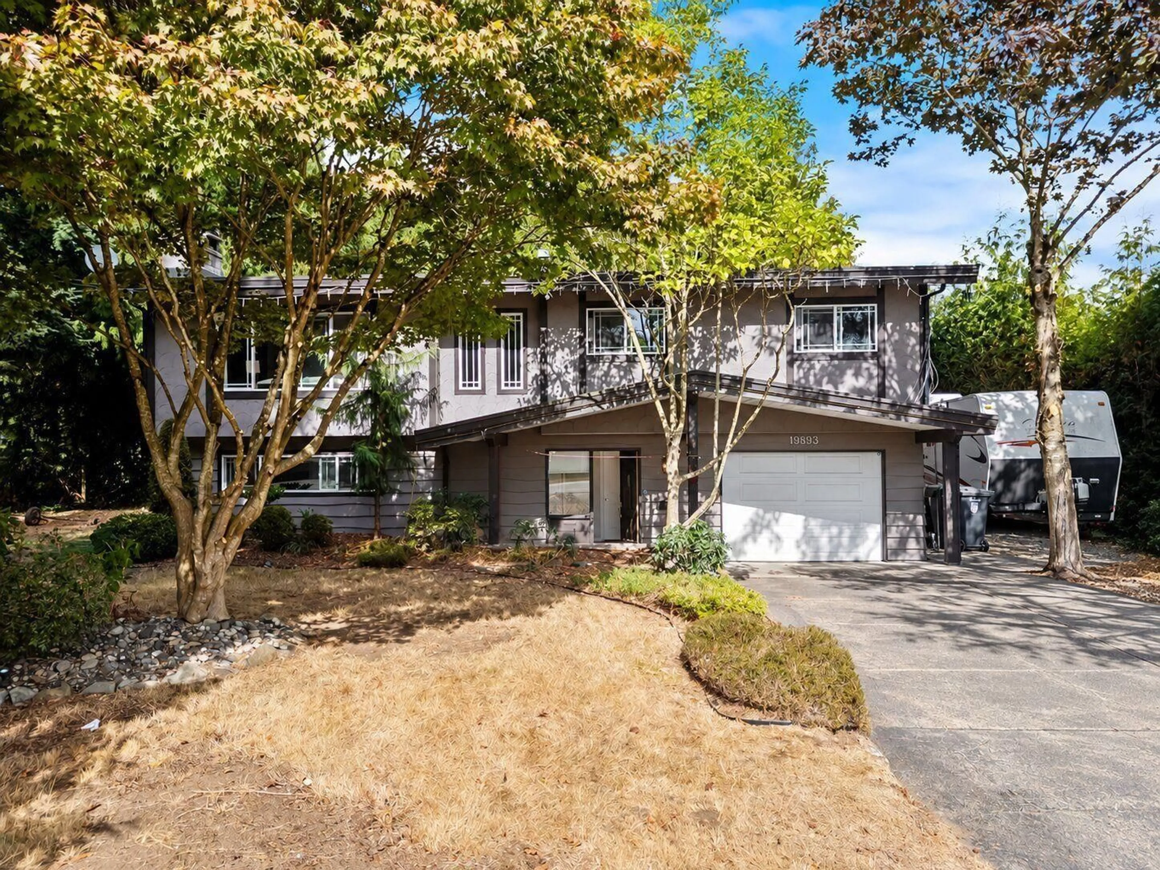 A pic from outside/outdoor area/front of a property/back of a property/a pic from drone, street for 19893 38A AVENUE, Langley British Columbia V3A2V1