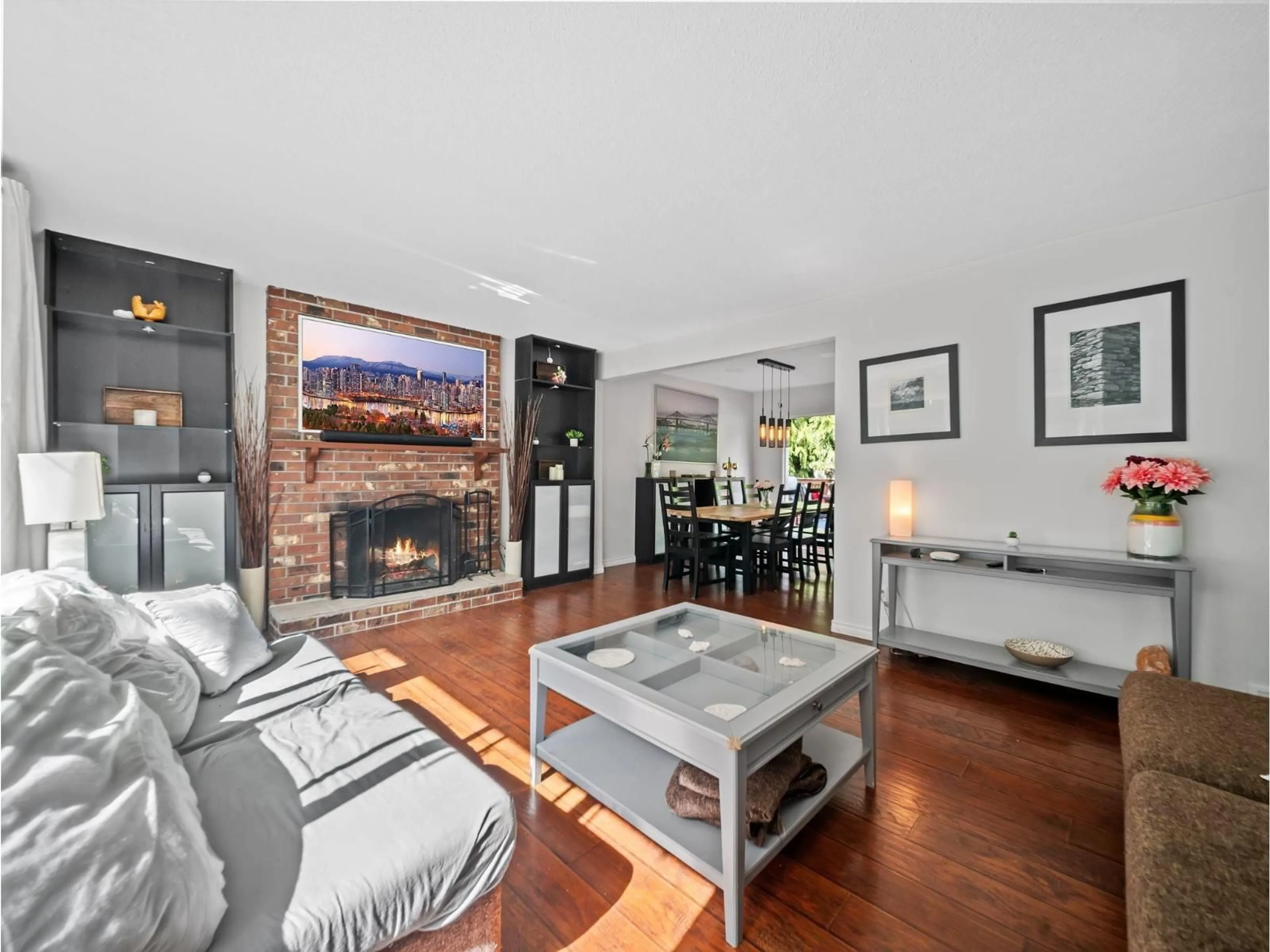 Living room with furniture, wood/laminate floor for 19893 38A AVENUE, Langley British Columbia V3A2V1