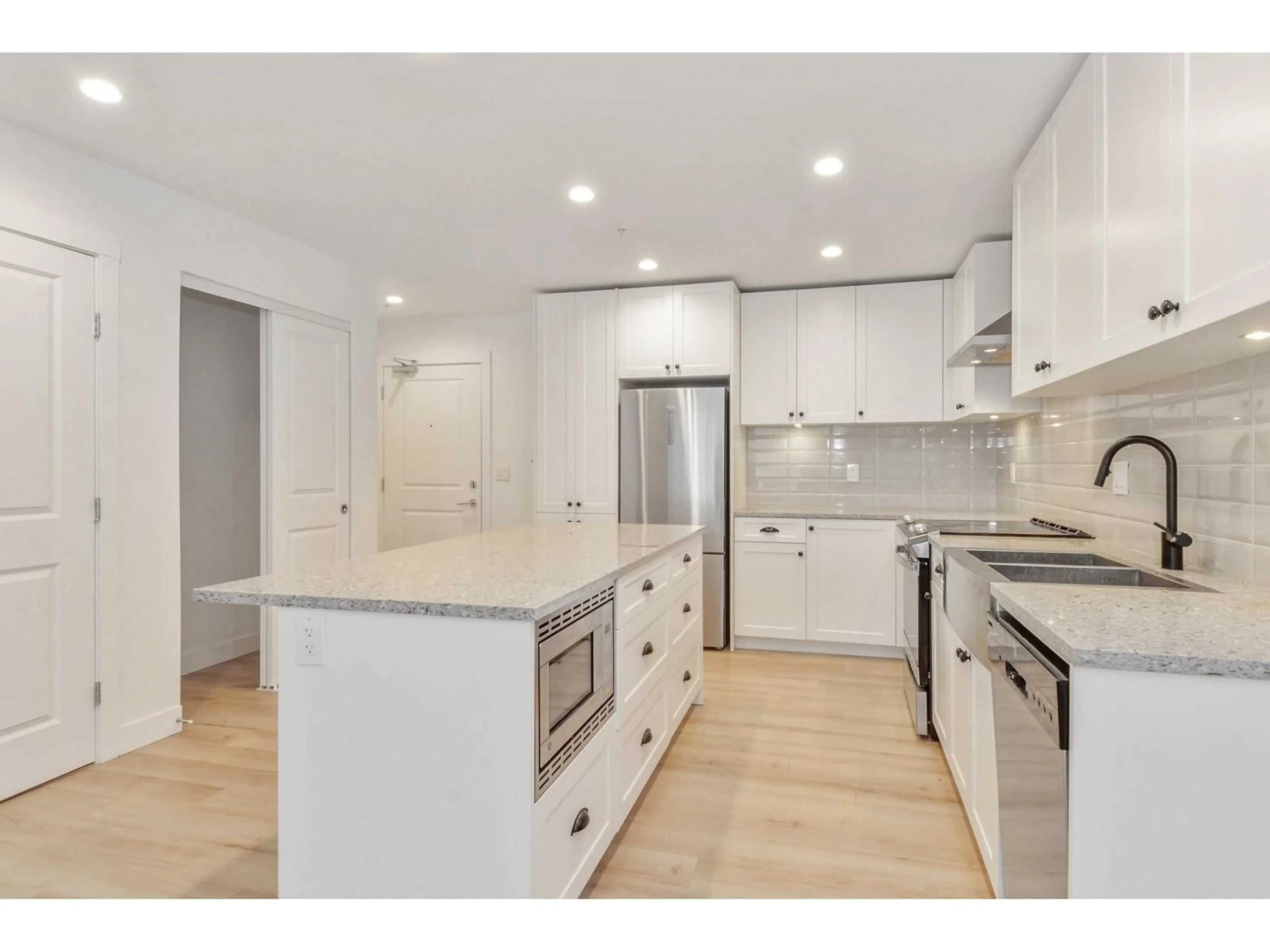 Open concept kitchen, unknown for A108 - 20487 65 AVENUE, Langley British Columbia V2Y3K5
