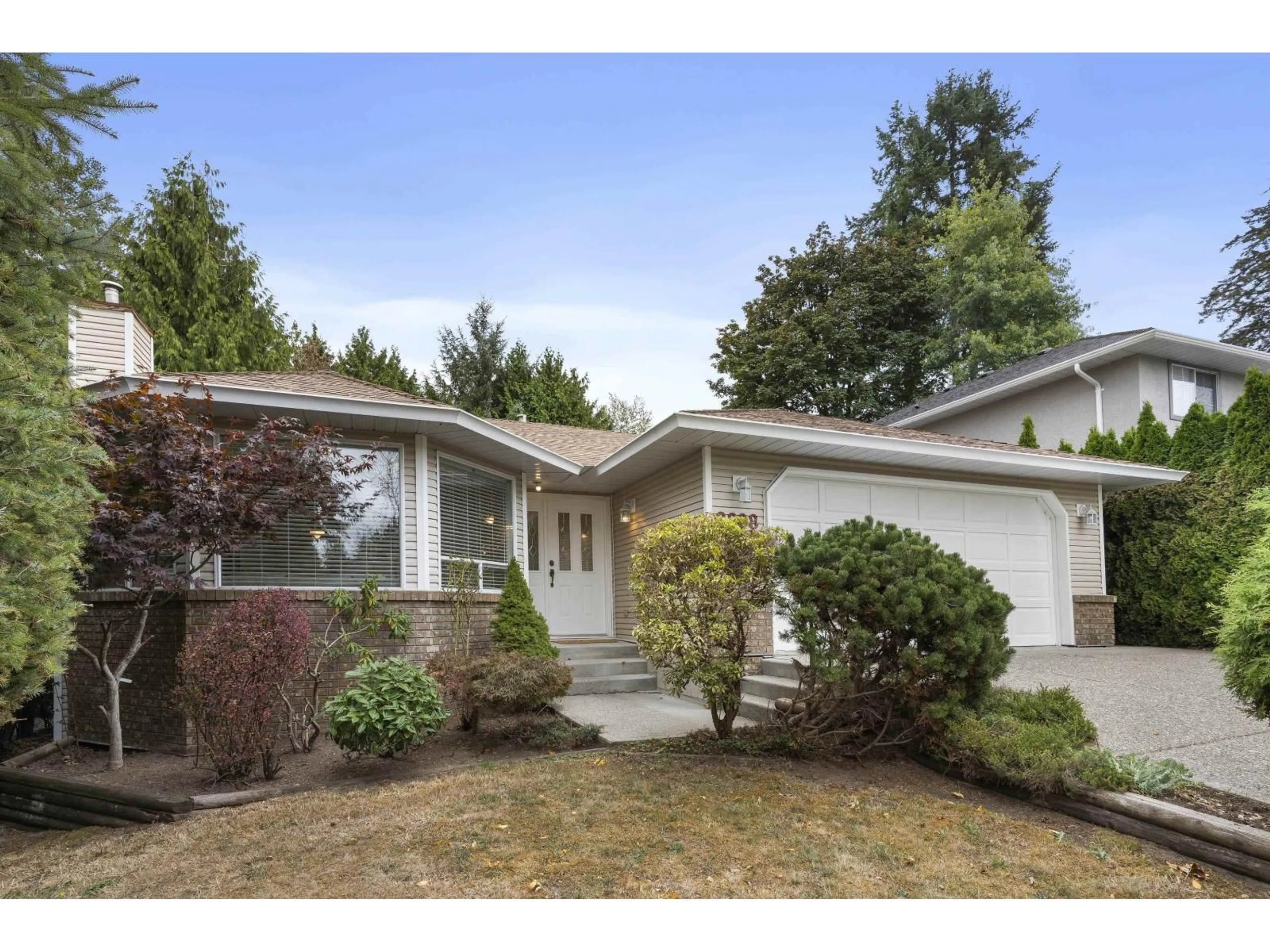 Home with vinyl exterior material, street for 2888 153A STREET, Surrey British Columbia V4P1G5