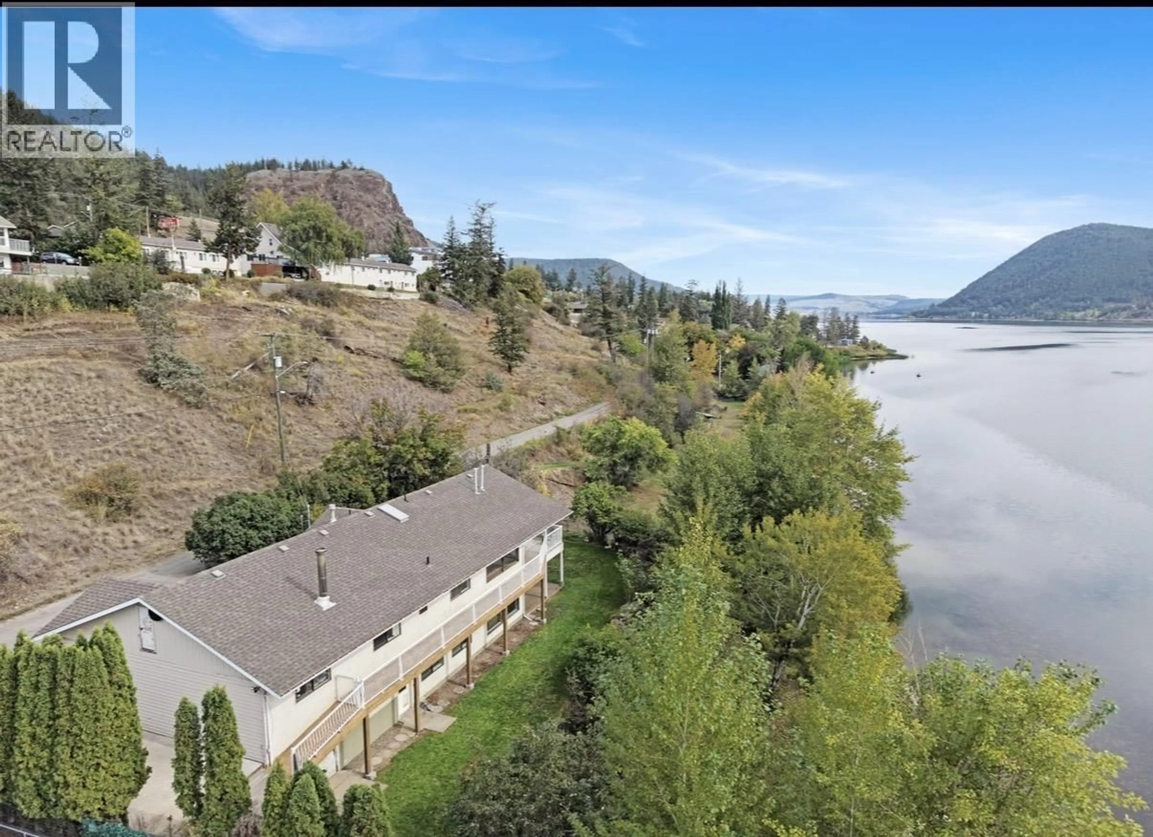 A pic from outside/outdoor area/front of a property/back of a property/a pic from drone, water/lake/river/ocean view for 1555 DUNCAN ROAD, Williams Lake British Columbia V2G5K5