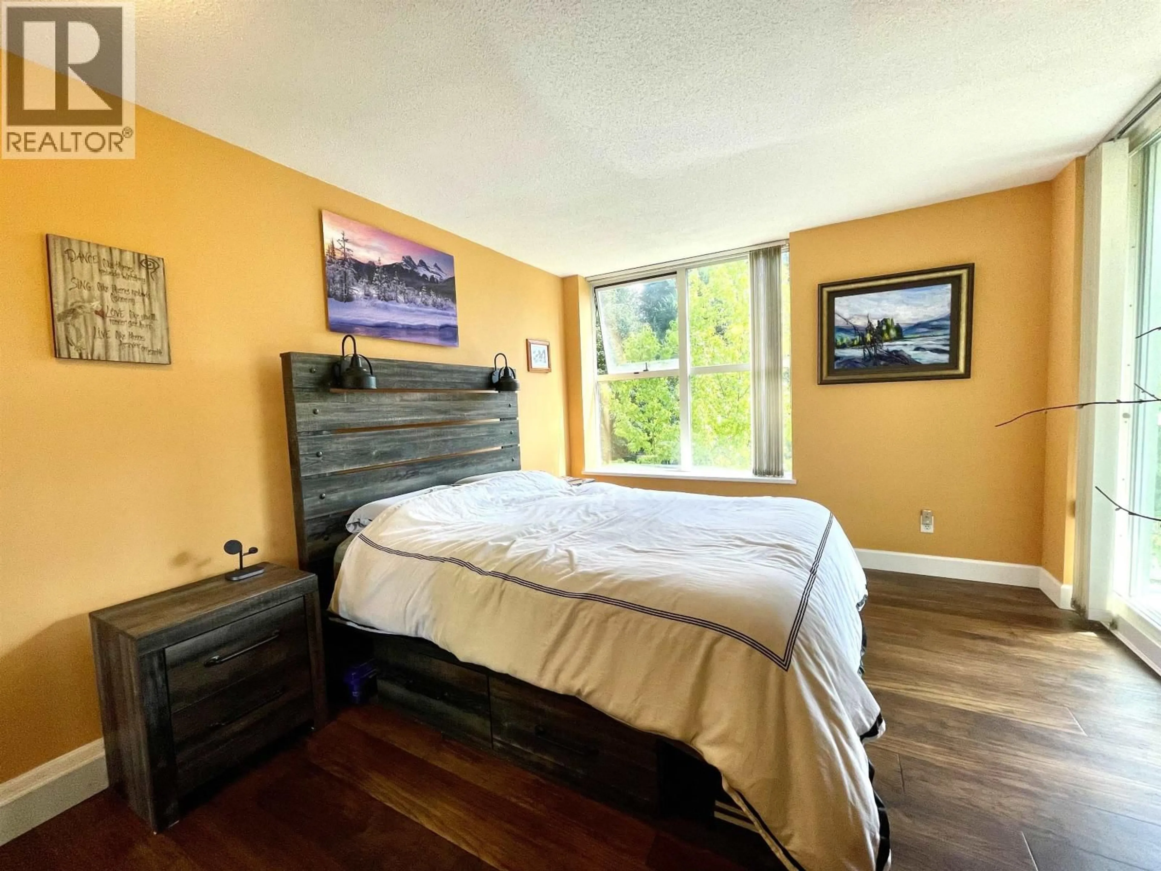 Bedroom with bed, wood/laminate floor for 505 - 200 NEWPORT DRIVE, Port Moody British Columbia V3H5B7