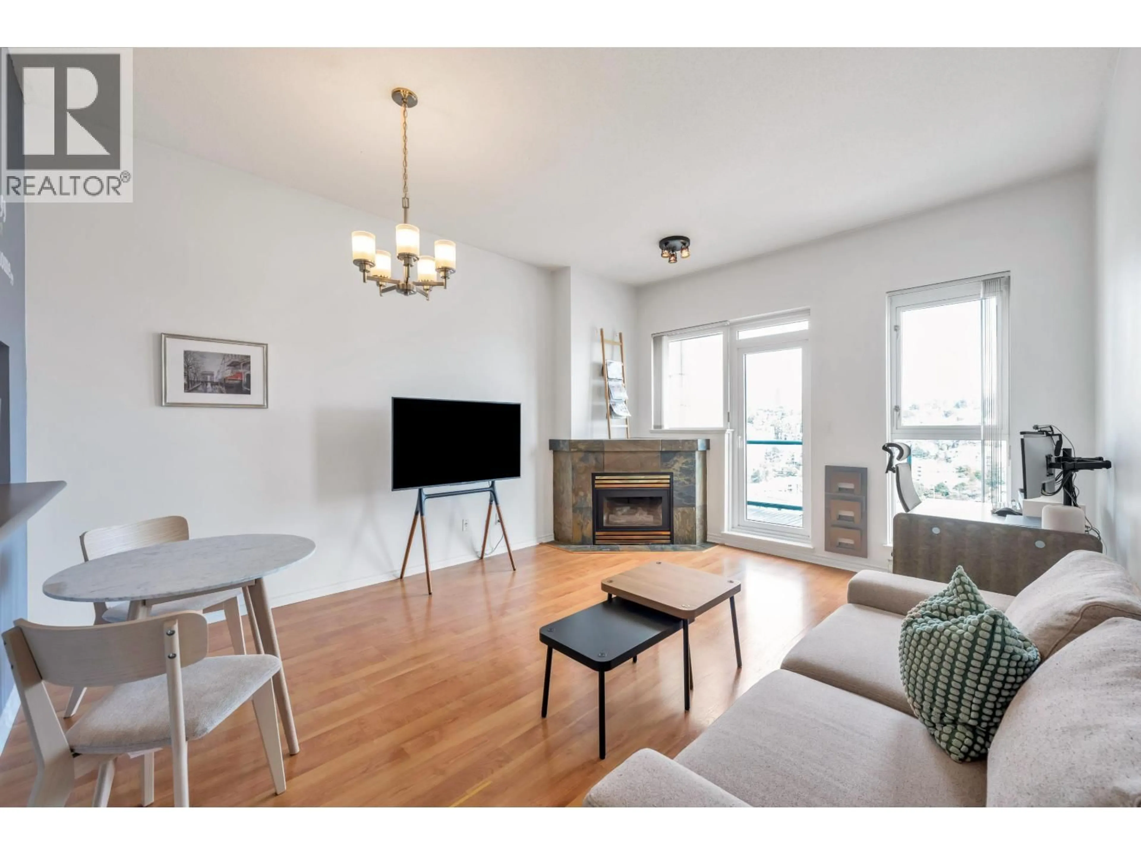 Living room with furniture, wood/laminate floor for 2205 - 10 LAGUNA COURT, New Westminster British Columbia V3M6W3