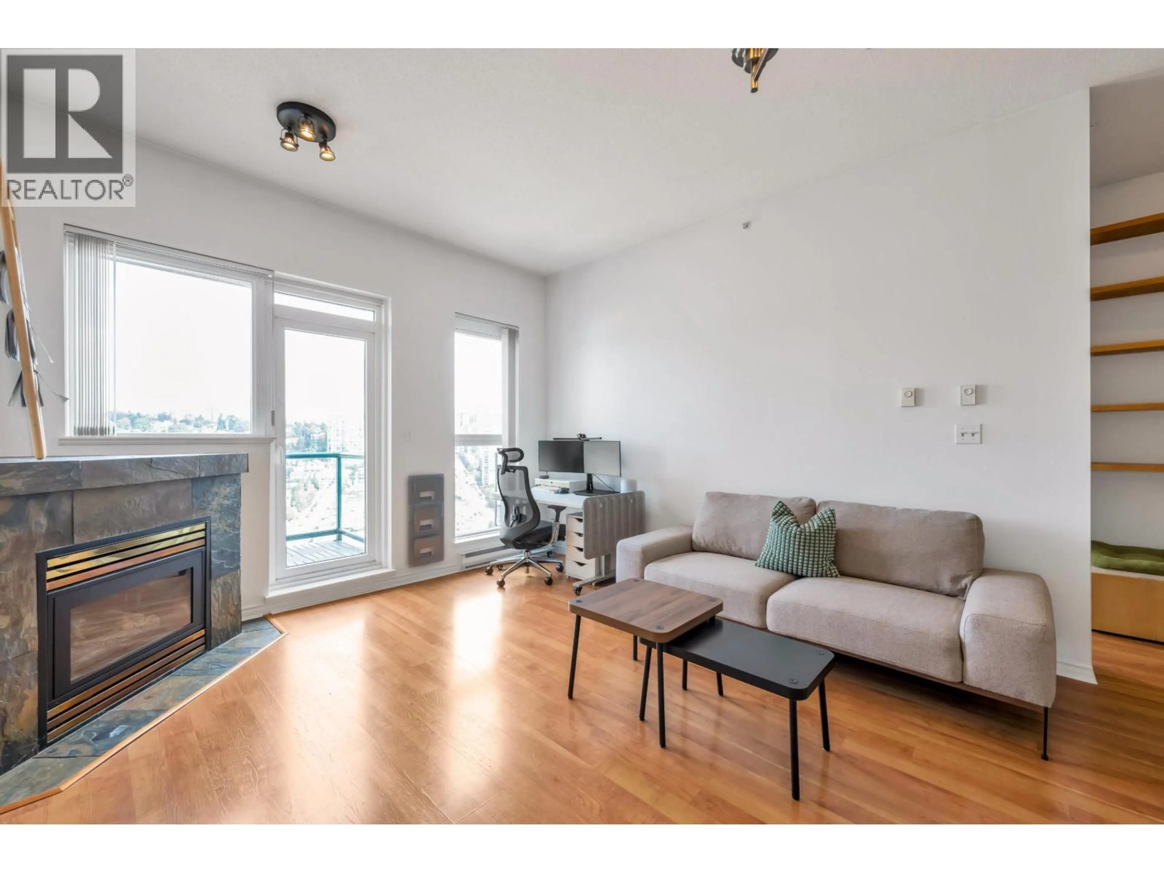 Living room with furniture, wood/laminate floor for 2205 - 10 LAGUNA COURT, New Westminster British Columbia V3M6W3