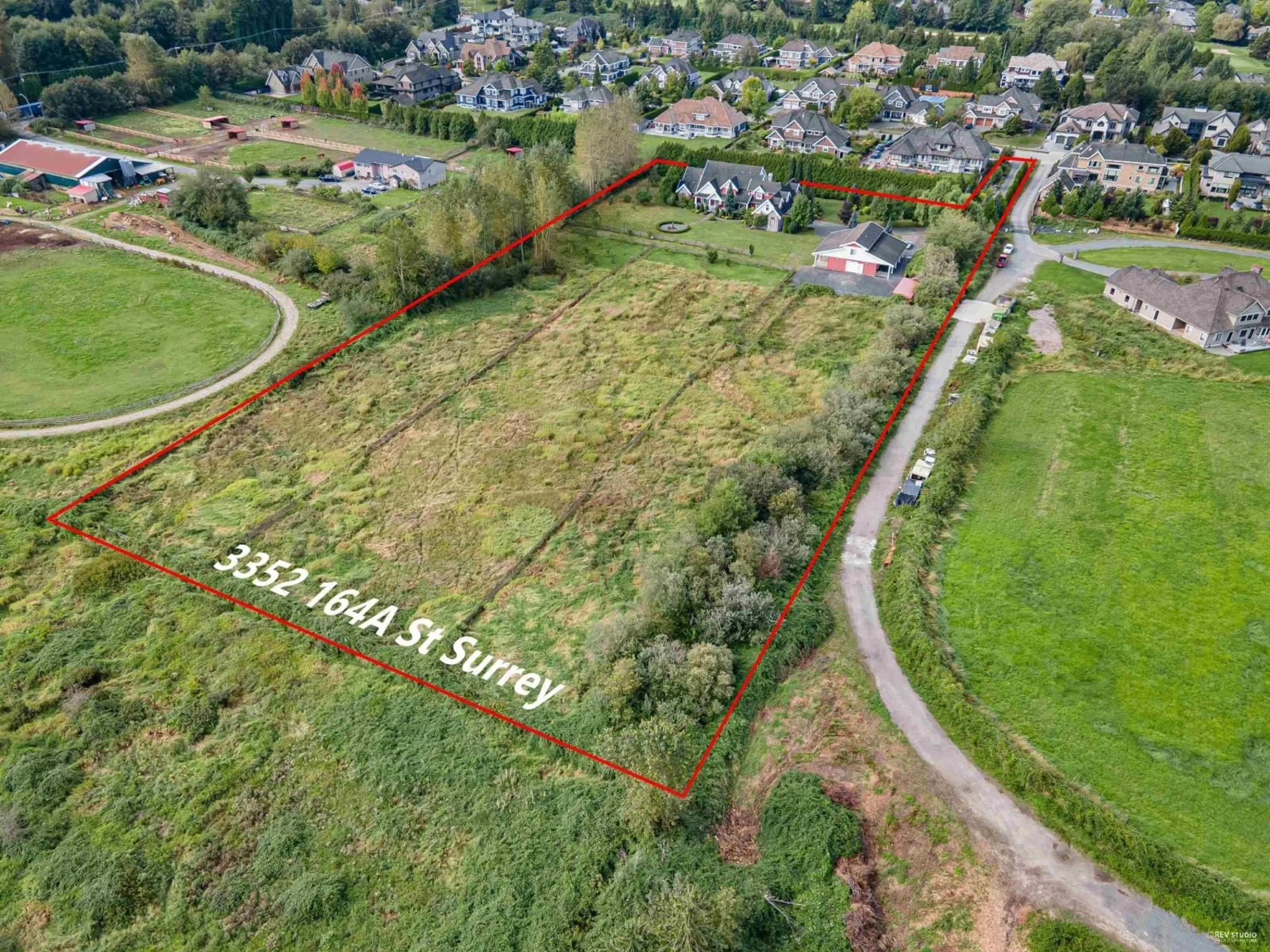 A pic from outside/outdoor area/front of a property/back of a property/a pic from drone, unknown for 3352 164A STREET, Surrey British Columbia V3Z0G5