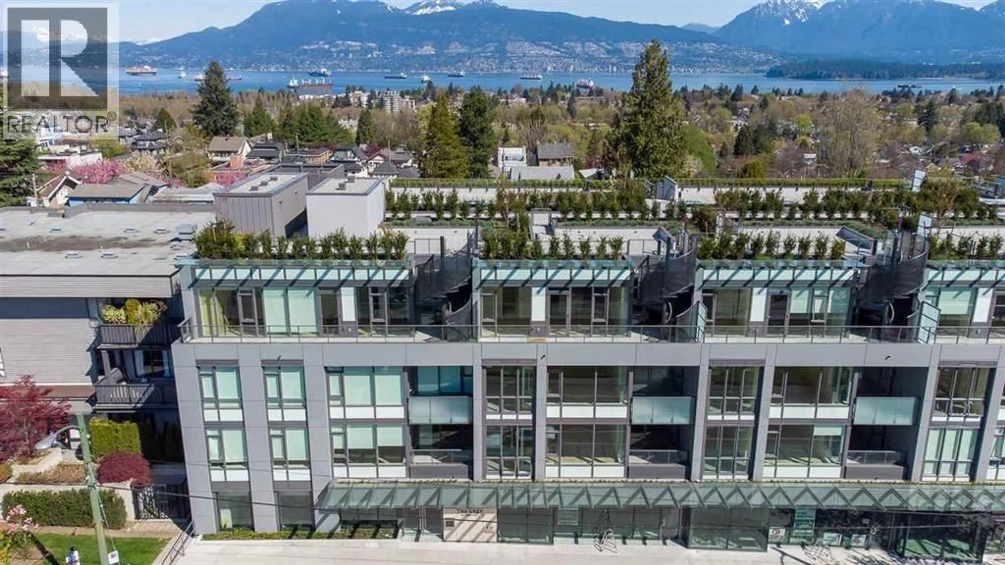 A pic from outside/outdoor area/front of a property/back of a property/a pic from drone, mountain view for 308 - 3639 16TH AVENUE, Vancouver British Columbia V6R3C3