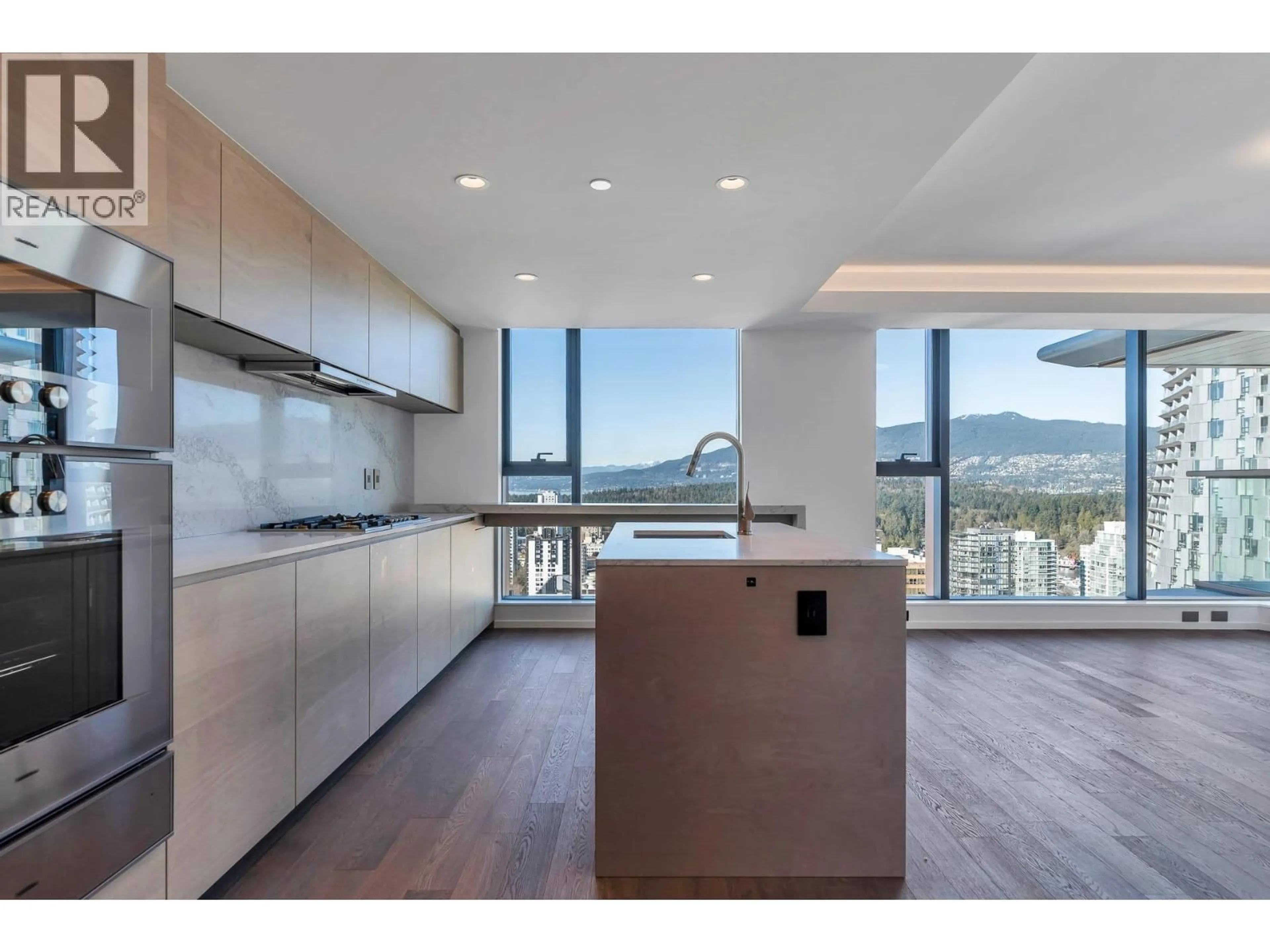 Open concept kitchen, wood/laminate floor for 2402 - 1408 ROBSON STREET, Vancouver British Columbia V6G0E6
