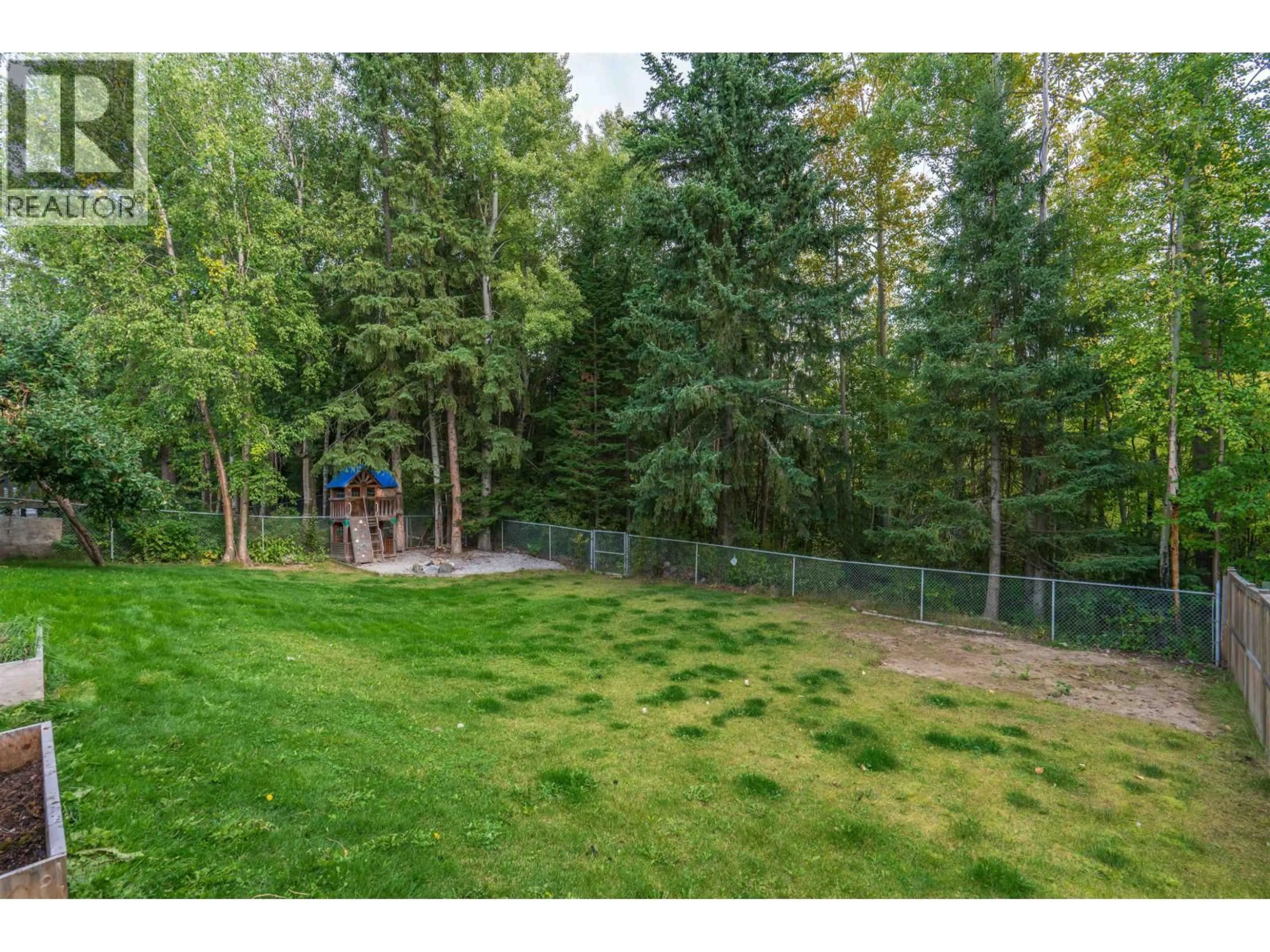 A pic from outside/outdoor area/front of a property/back of a property/a pic from drone, forest/trees view for 7718 ST MARK CRESCENT, Prince George British Columbia V2N4B8