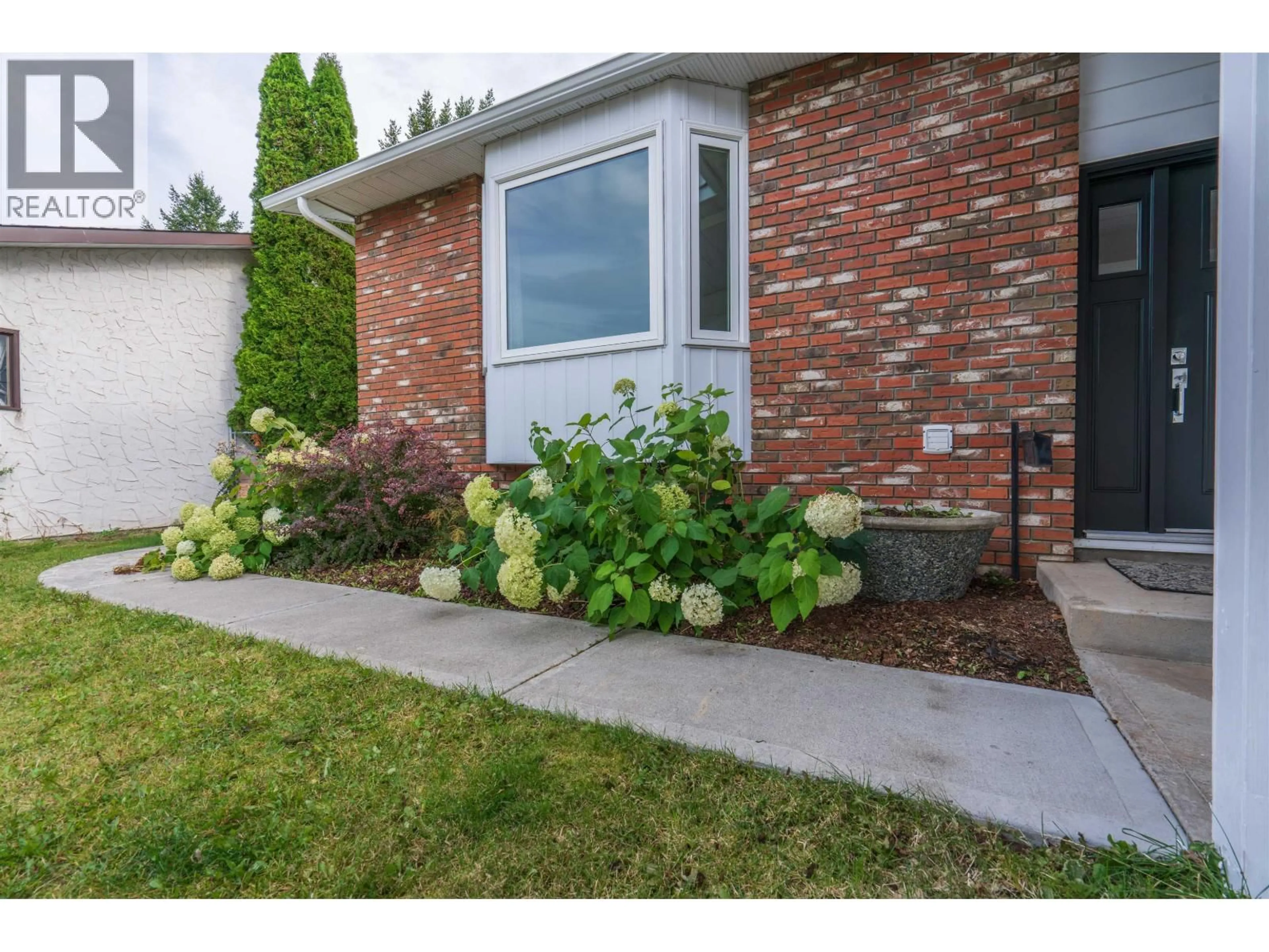 Home with brick exterior material, street for 7718 ST MARK CRESCENT, Prince George British Columbia V2N4B8