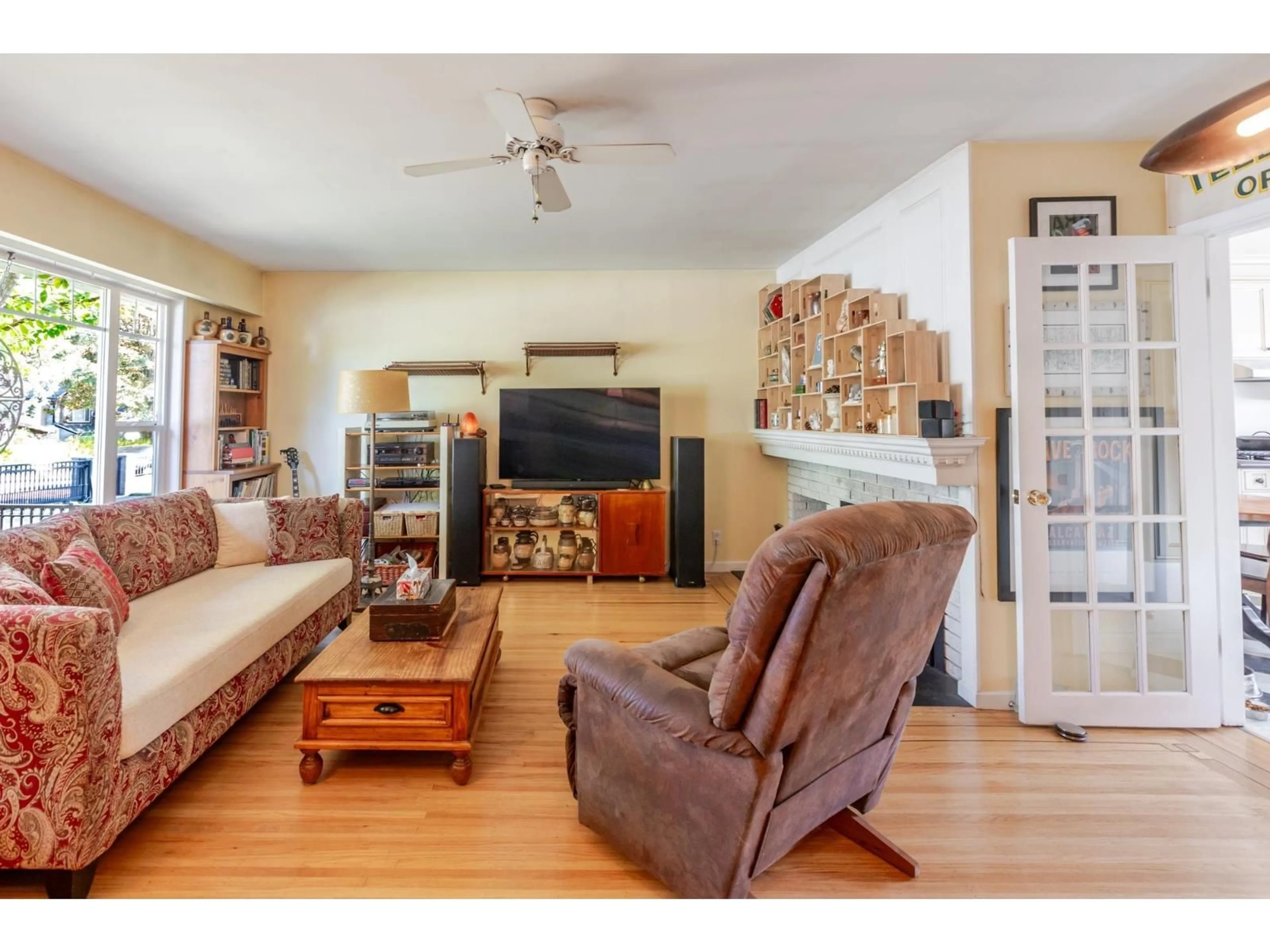 Living room with furniture, wood/laminate floor for 8625 144A STREET, Surrey British Columbia V3S2Y1