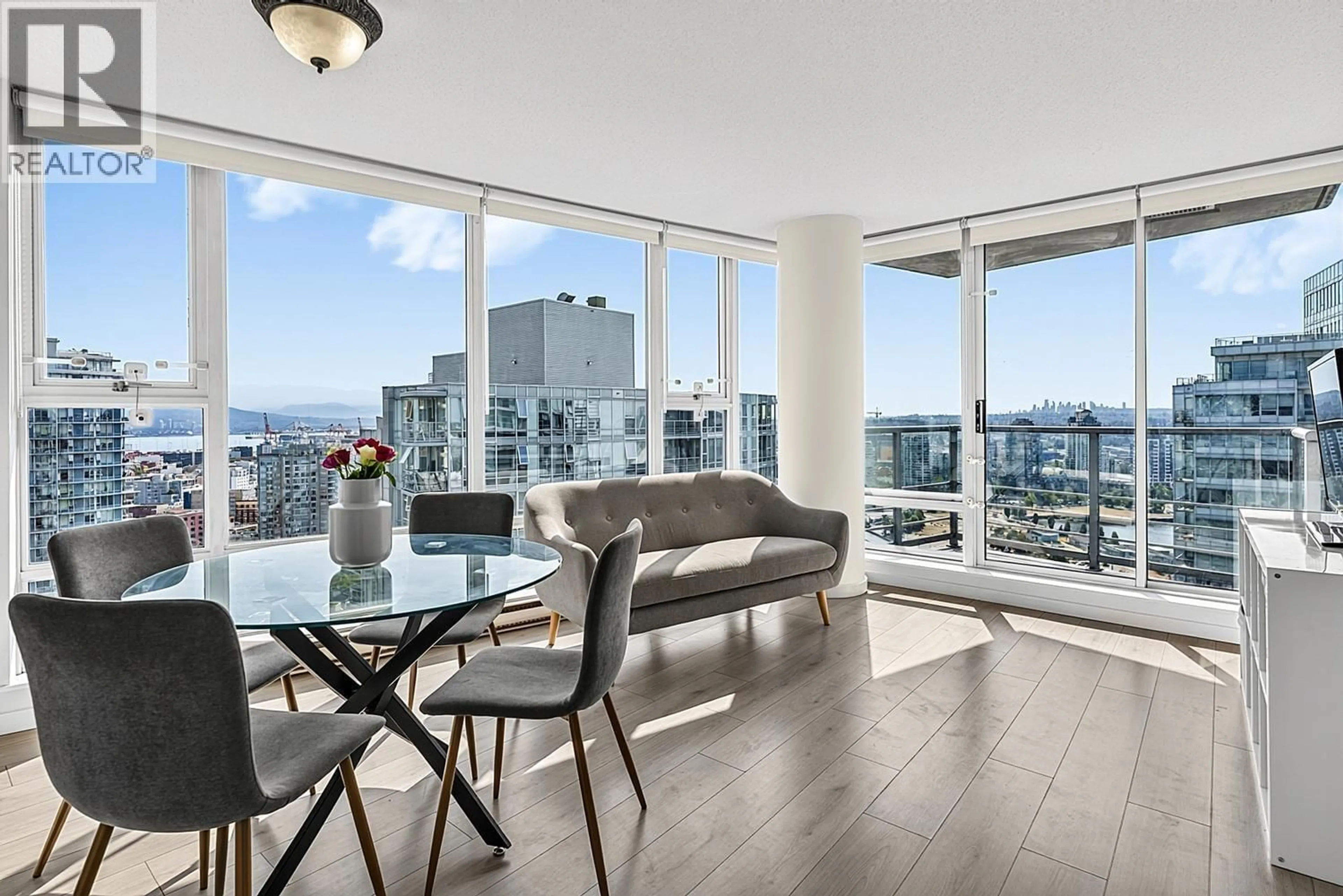 Living room with furniture, wood/laminate floor for 3008 - 668 CITADEL PARADE, Vancouver British Columbia V6B1W6
