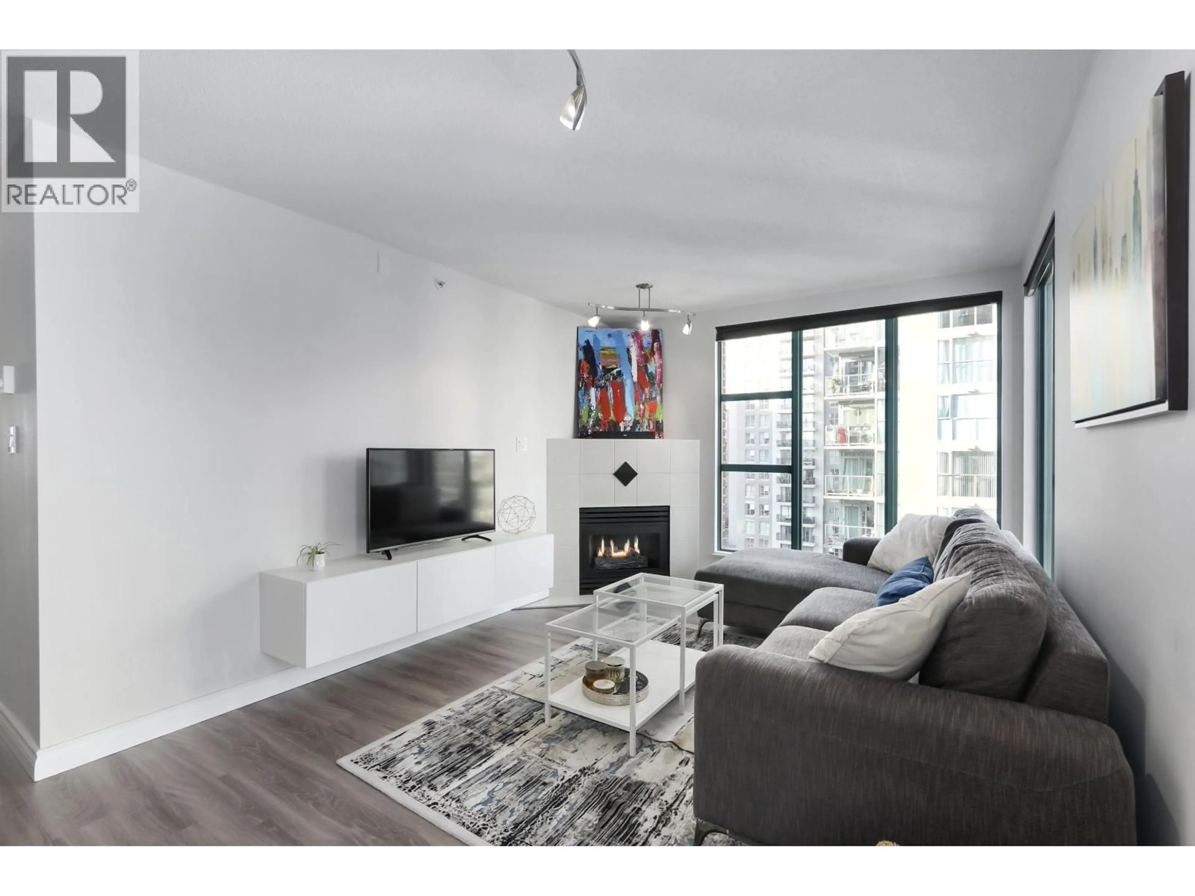 Living room with furniture, wood/laminate floor for 1502 - 939 HOMER STREET, Vancouver British Columbia V6B2W6