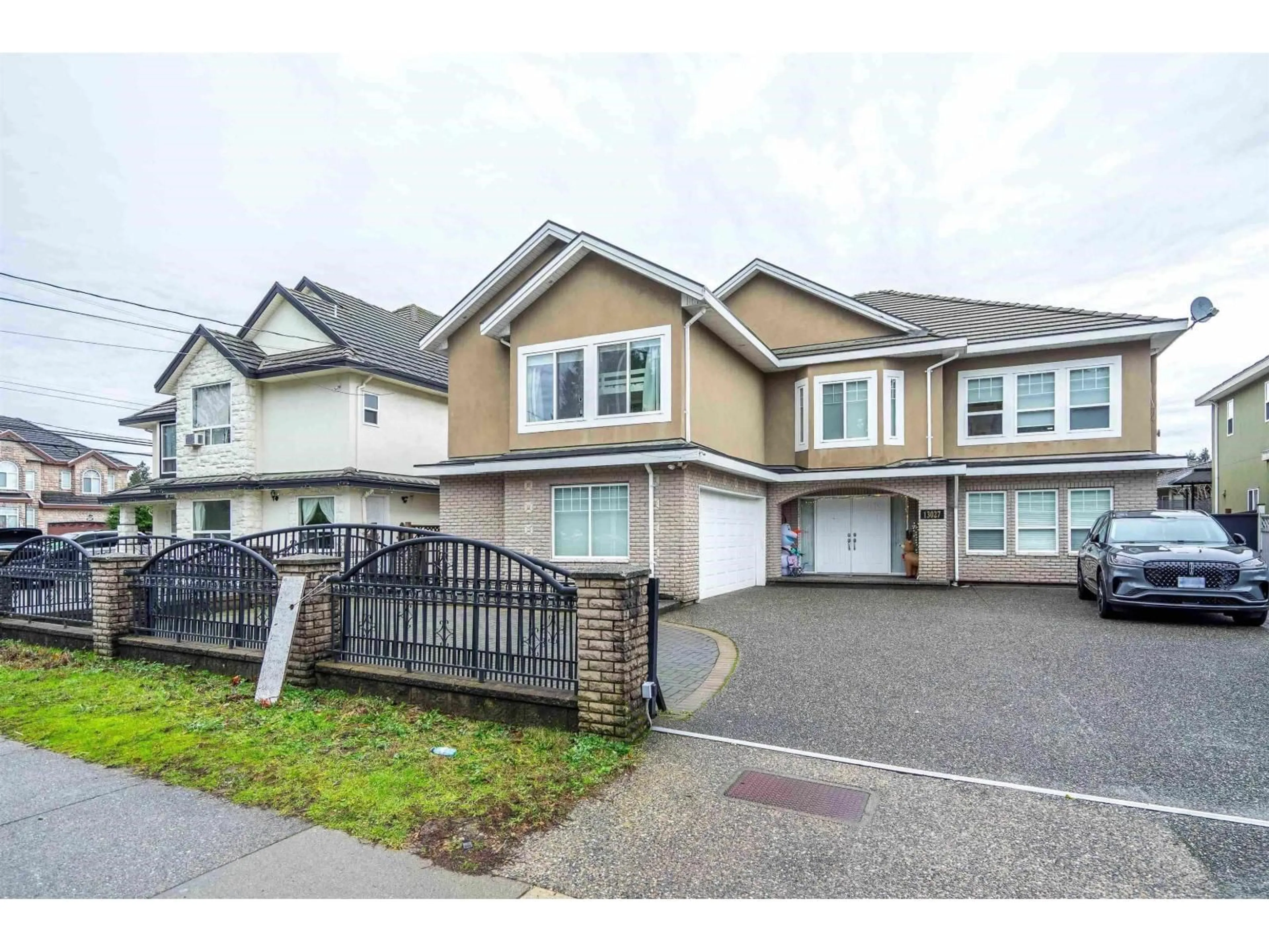 Home with vinyl exterior material, street for 13027 68 AVENUE, Surrey British Columbia V3W2E5