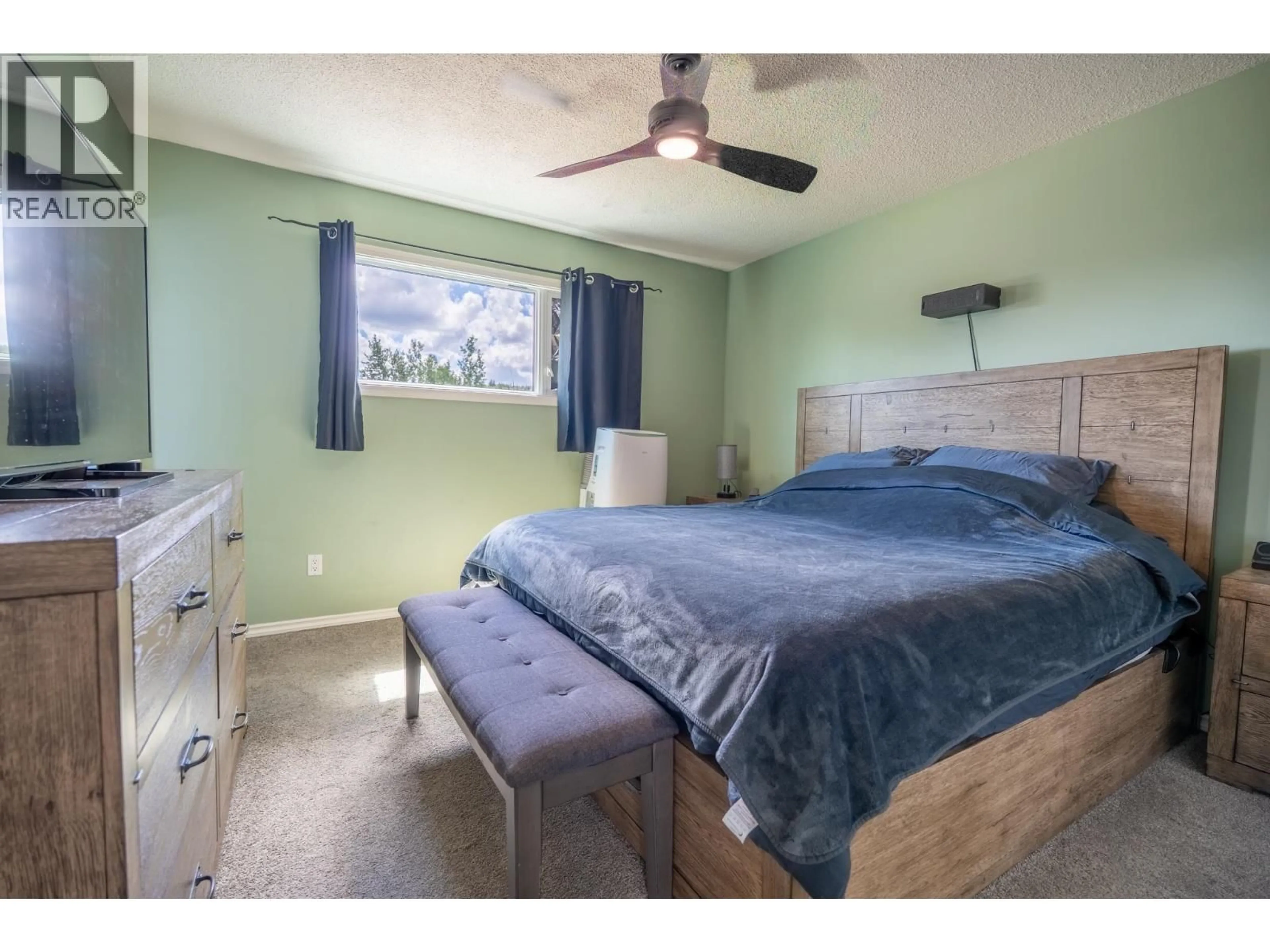 Bedroom with bed, wood/laminate floor for 3644 HESSE PLACE, Prince George British Columbia V2N4J9
