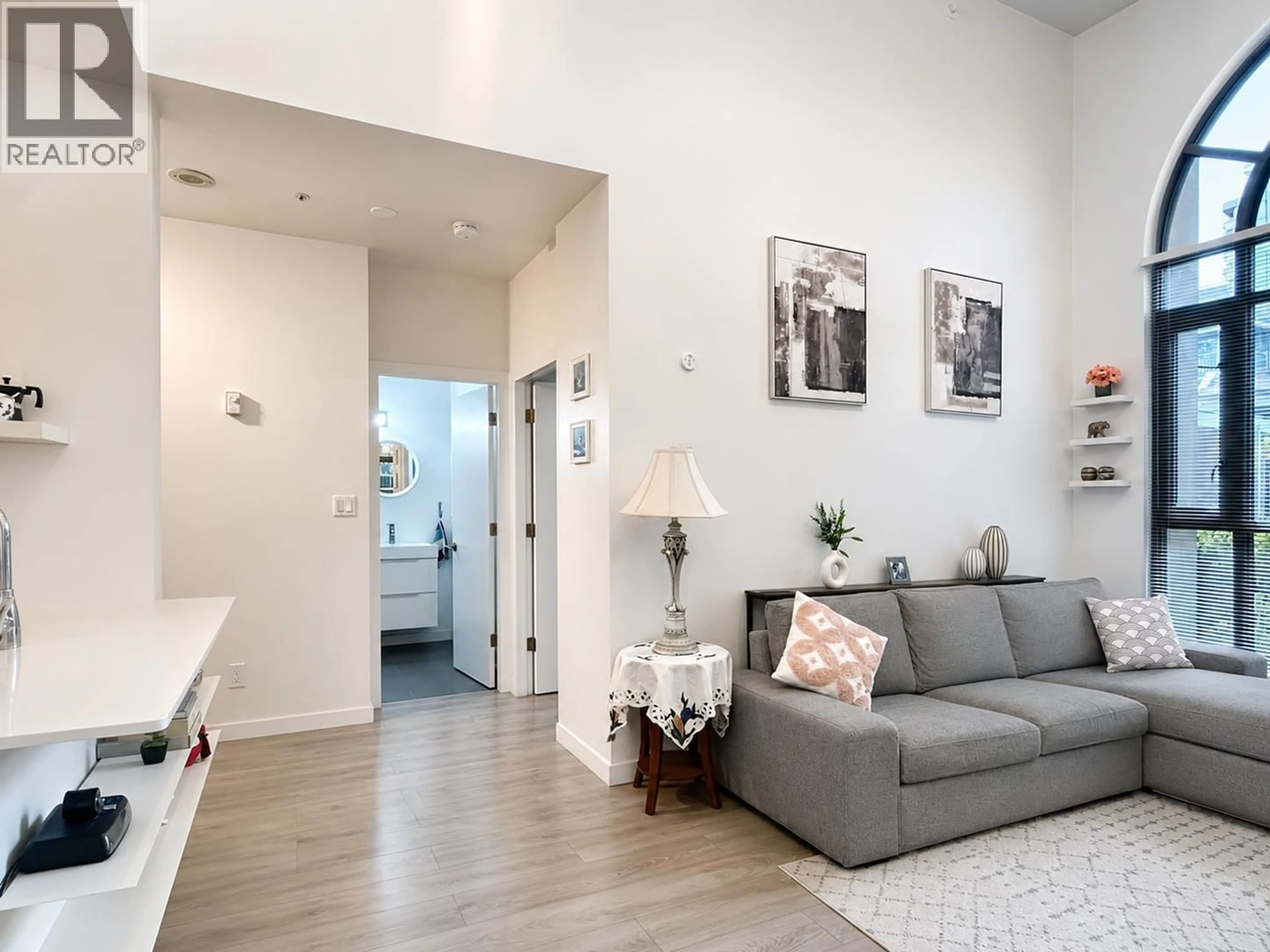Living room with furniture, unknown for 101 - 3070 GUILDFORD WAY, Coquitlam British Columbia V3B7R8