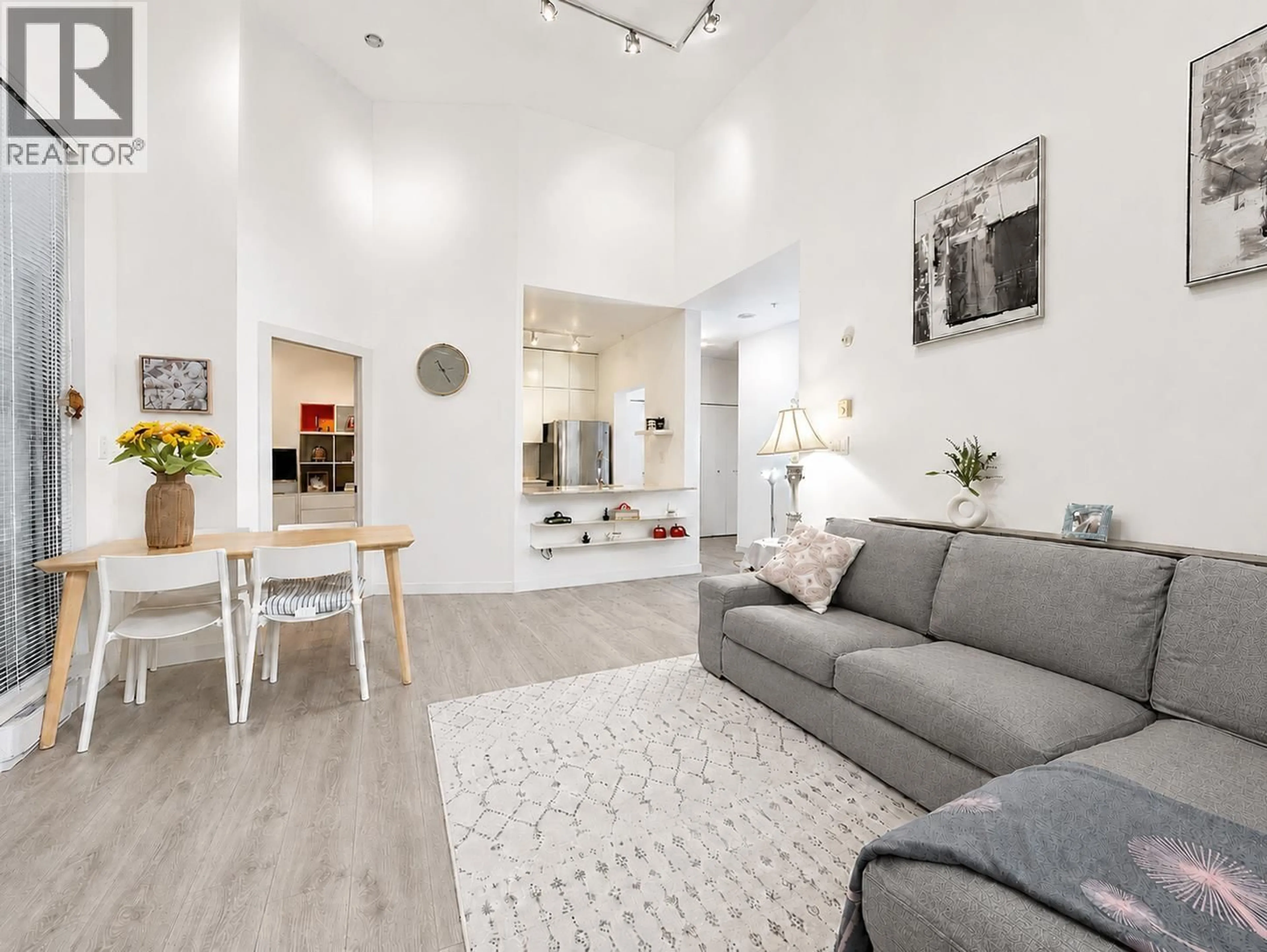 Living room with furniture, unknown for 101 - 3070 GUILDFORD WAY, Coquitlam British Columbia V3B7R8