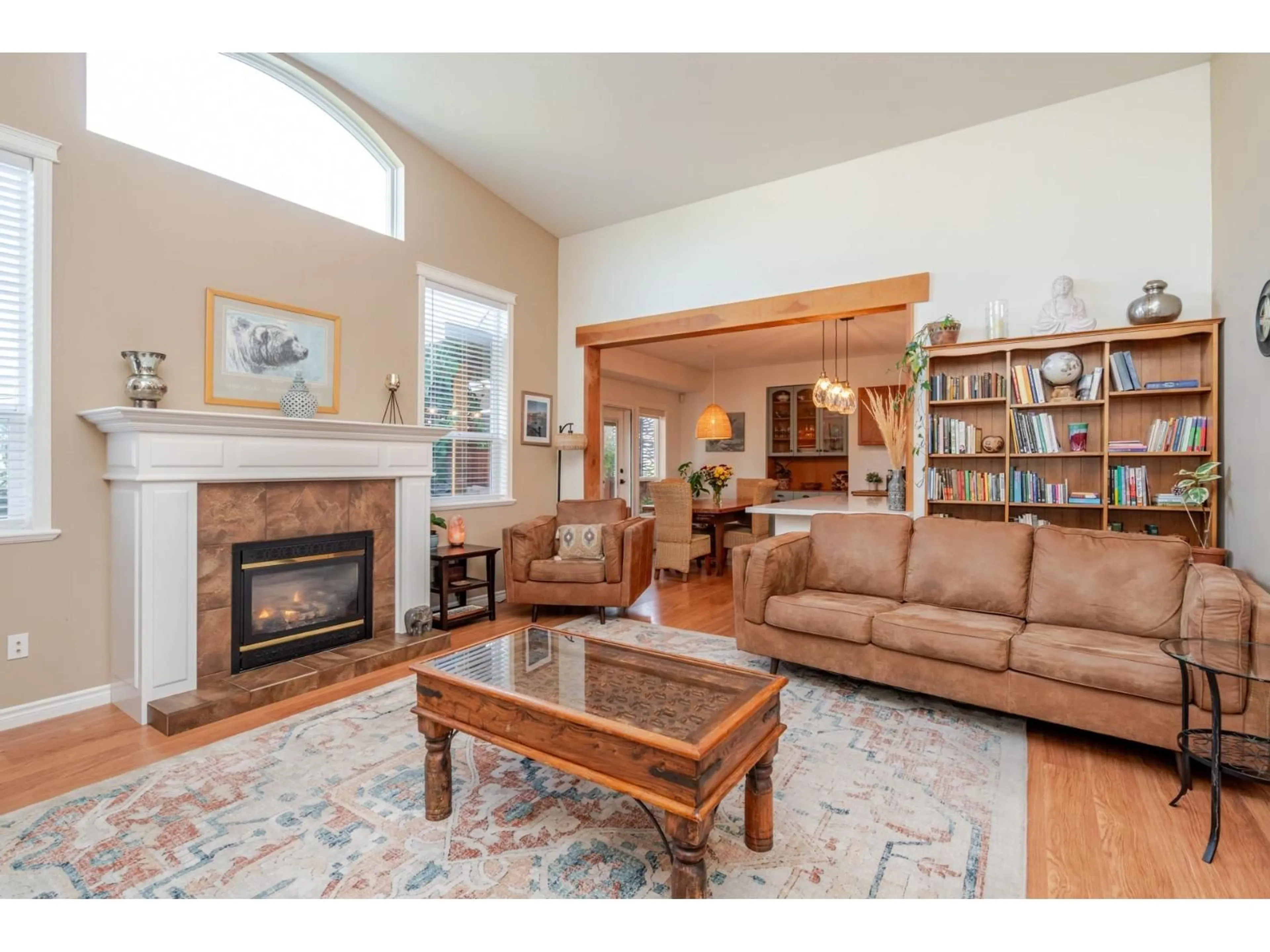 Living room with furniture, wood/laminate floor for 6820 SHEFFIELD WAY, Chilliwack British Columbia V2R5T1