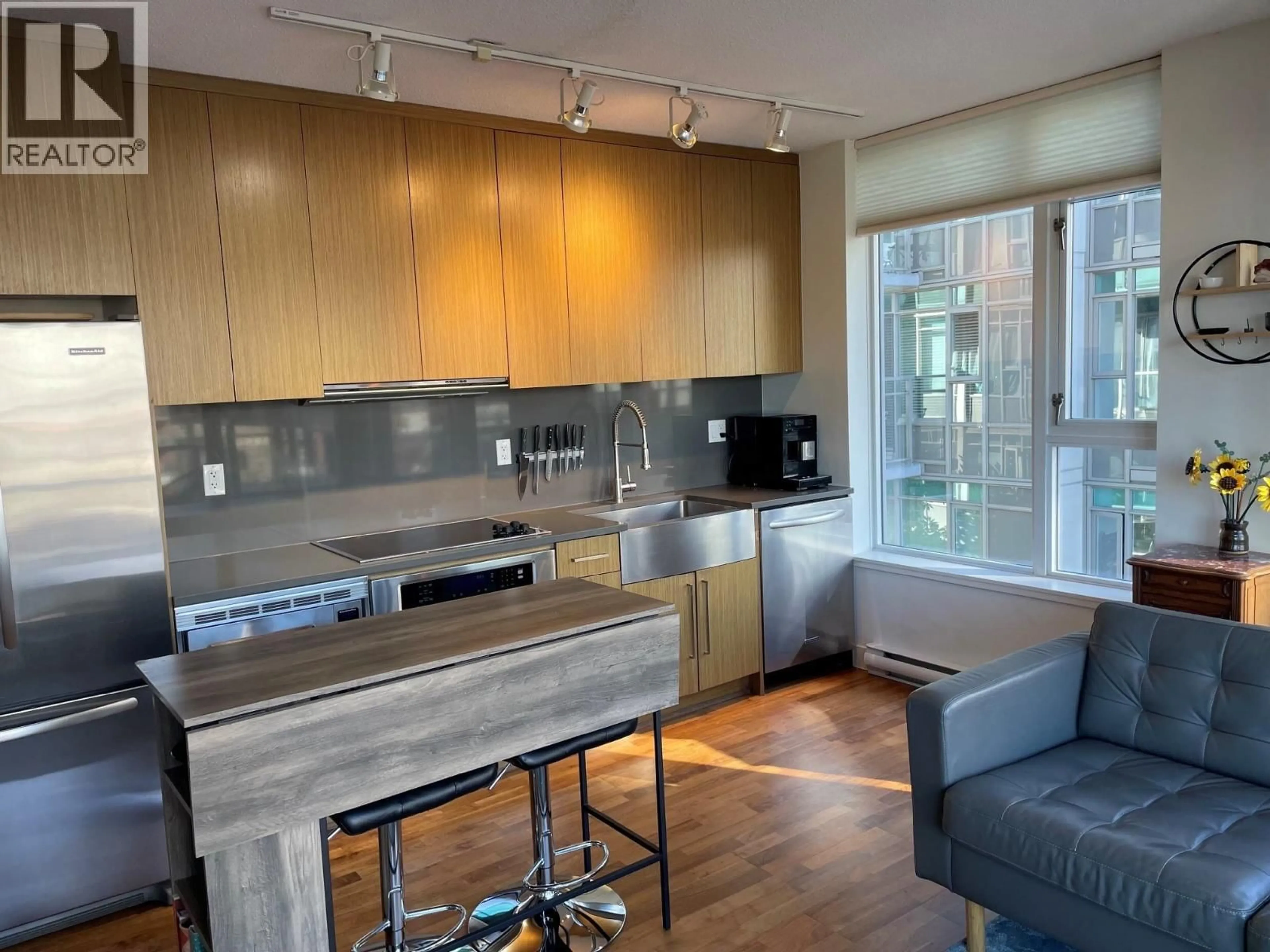 Open concept kitchen, unknown for 716 - 250 6TH AVENUE, Vancouver British Columbia V5T0B7