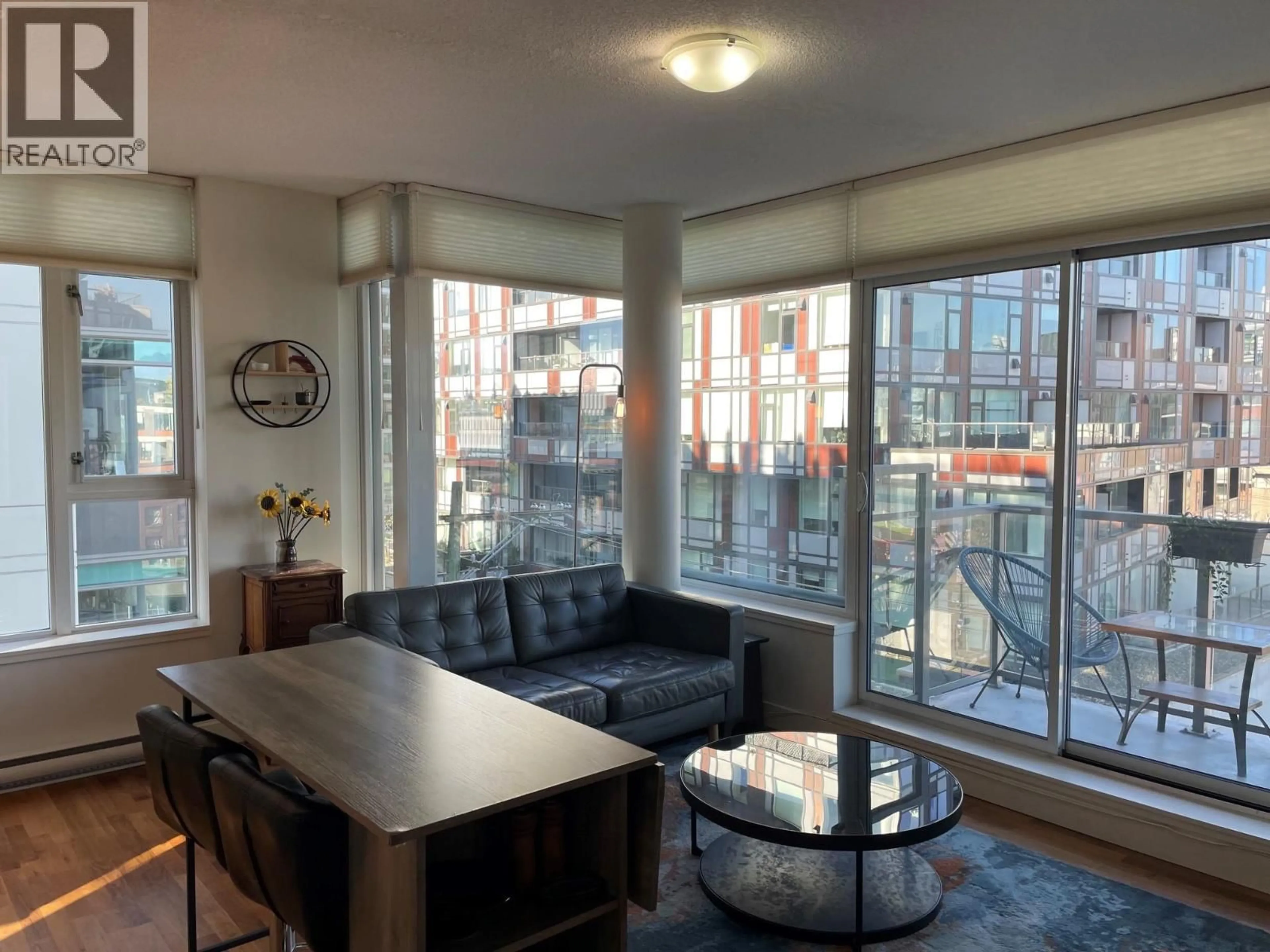 Living room with furniture, wood/laminate floor for 716 - 250 6TH AVENUE, Vancouver British Columbia V5T0B7