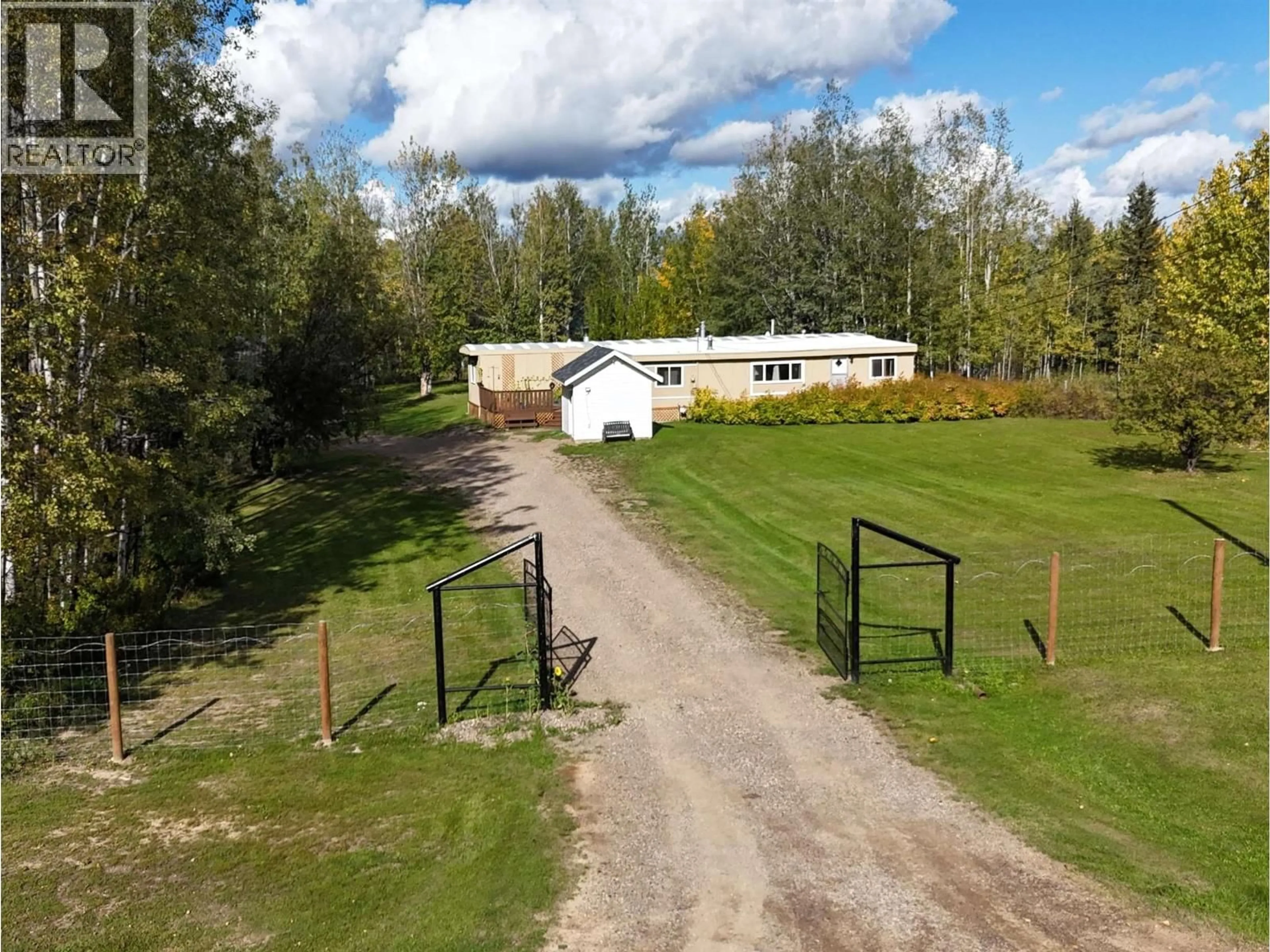 A pic from outside/outdoor area/front of a property/back of a property/a pic from drone, unknown for 8 FEDIW ROAD, Fort Nelson British Columbia V0C1R0