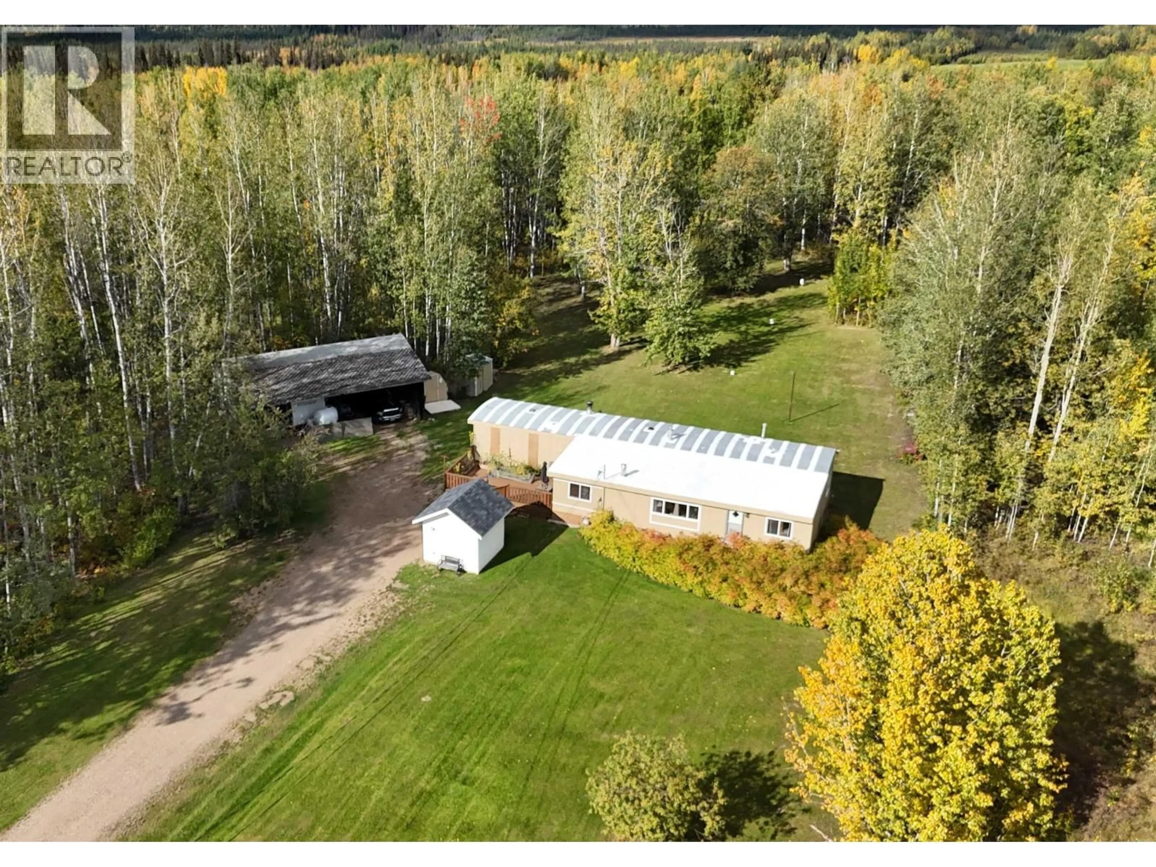 A pic from outside/outdoor area/front of a property/back of a property/a pic from drone, unknown for 8 FEDIW ROAD, Fort Nelson British Columbia V0C1R0