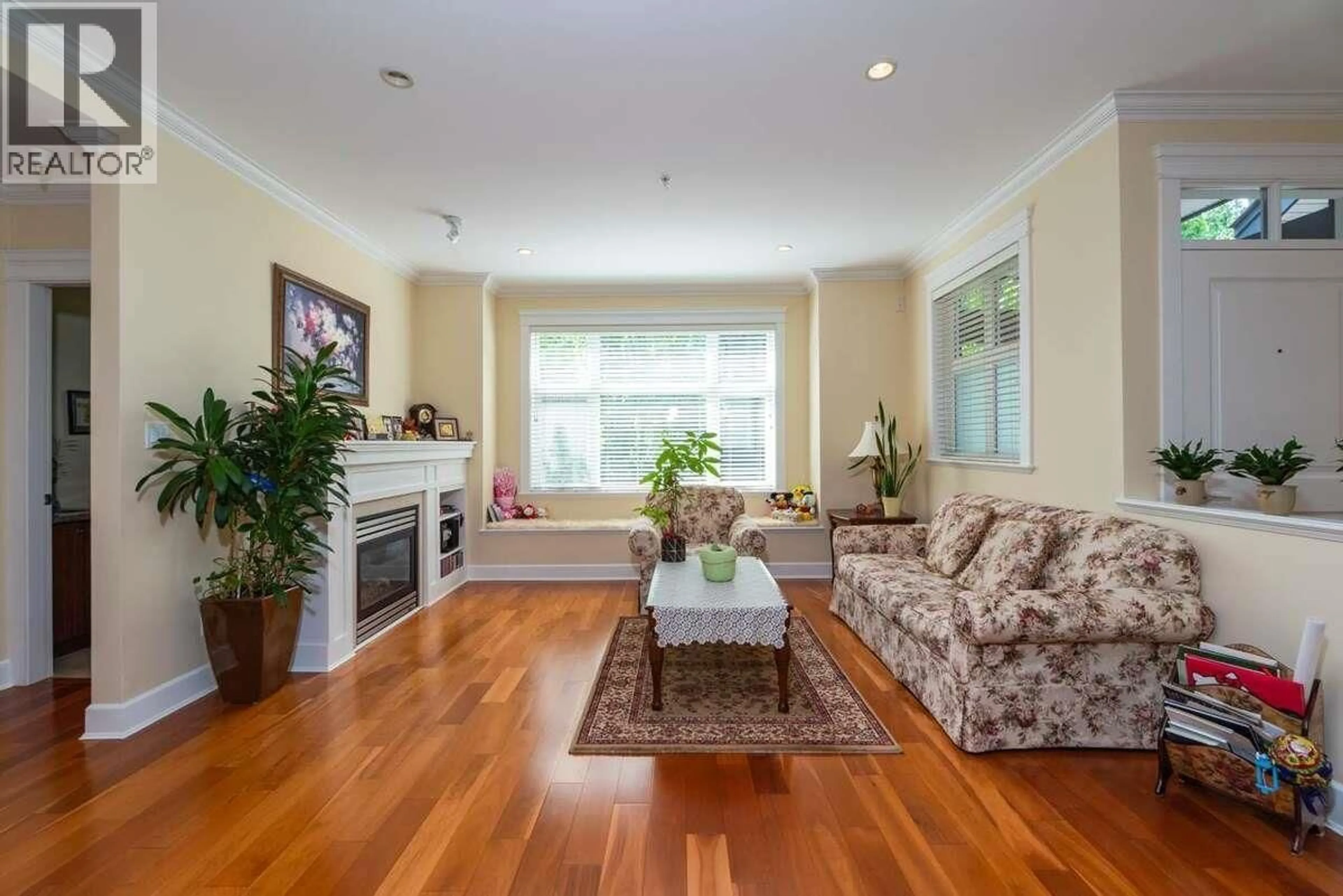 Living room with furniture, wood/laminate floor for 5 - 2780 ACADIA ROAD, Vancouver British Columbia V6T2L3