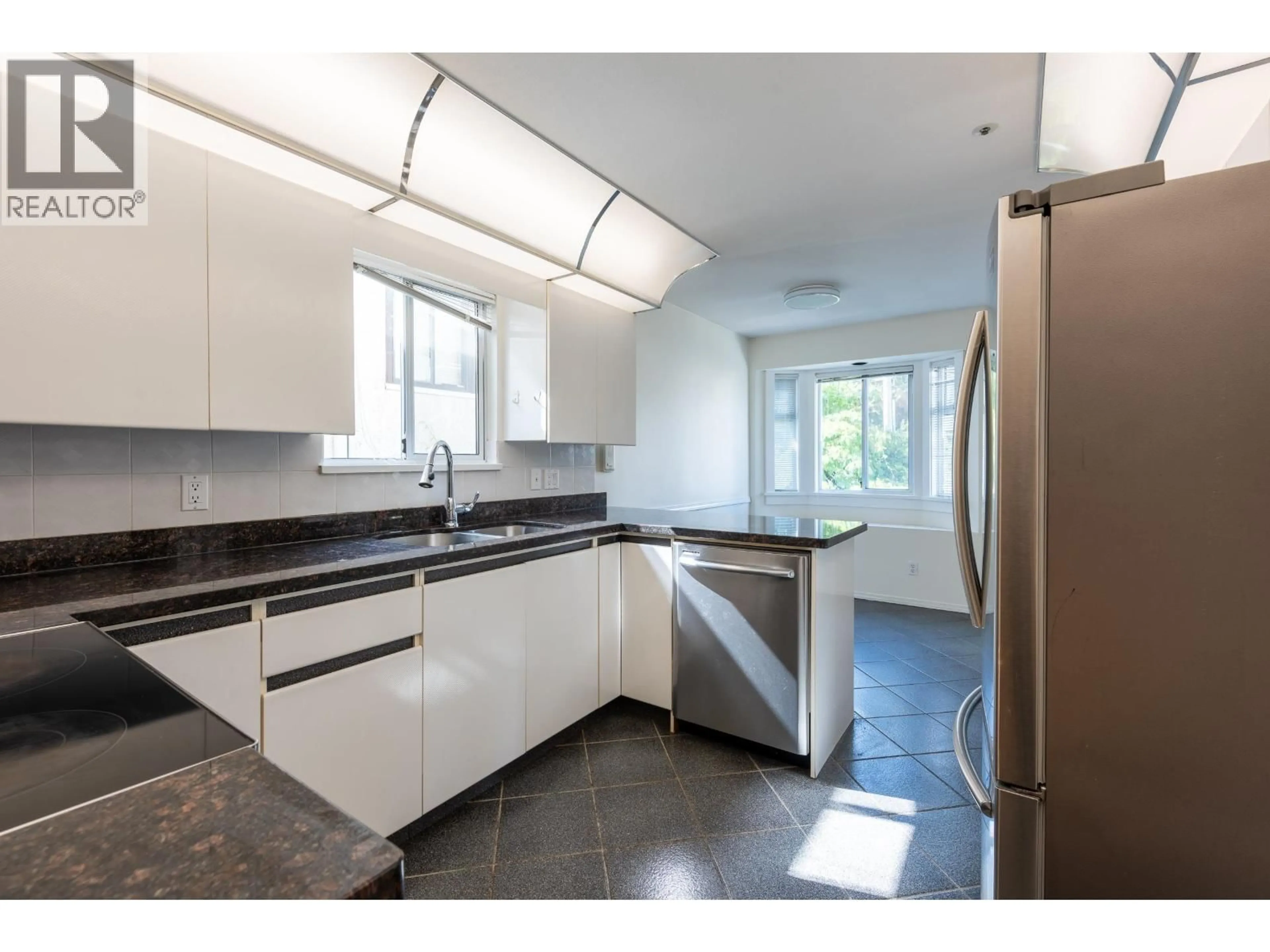 Standard kitchen, ceramic/tile floor for 6775 CULLODEN STREET, Vancouver British Columbia V5X4J5