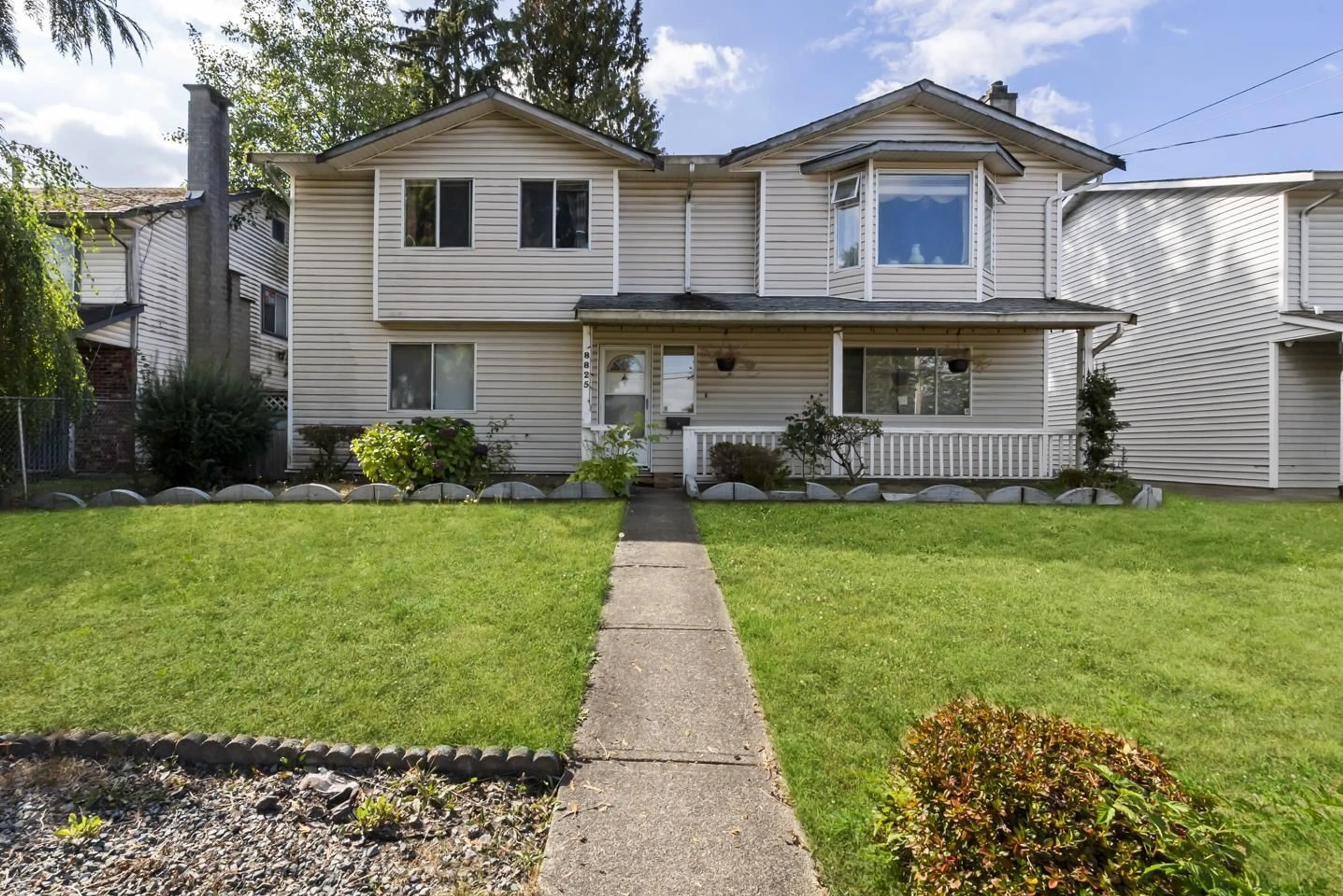 Home with vinyl exterior material, street for 8825 160 STREET, Surrey British Columbia V4N2X8